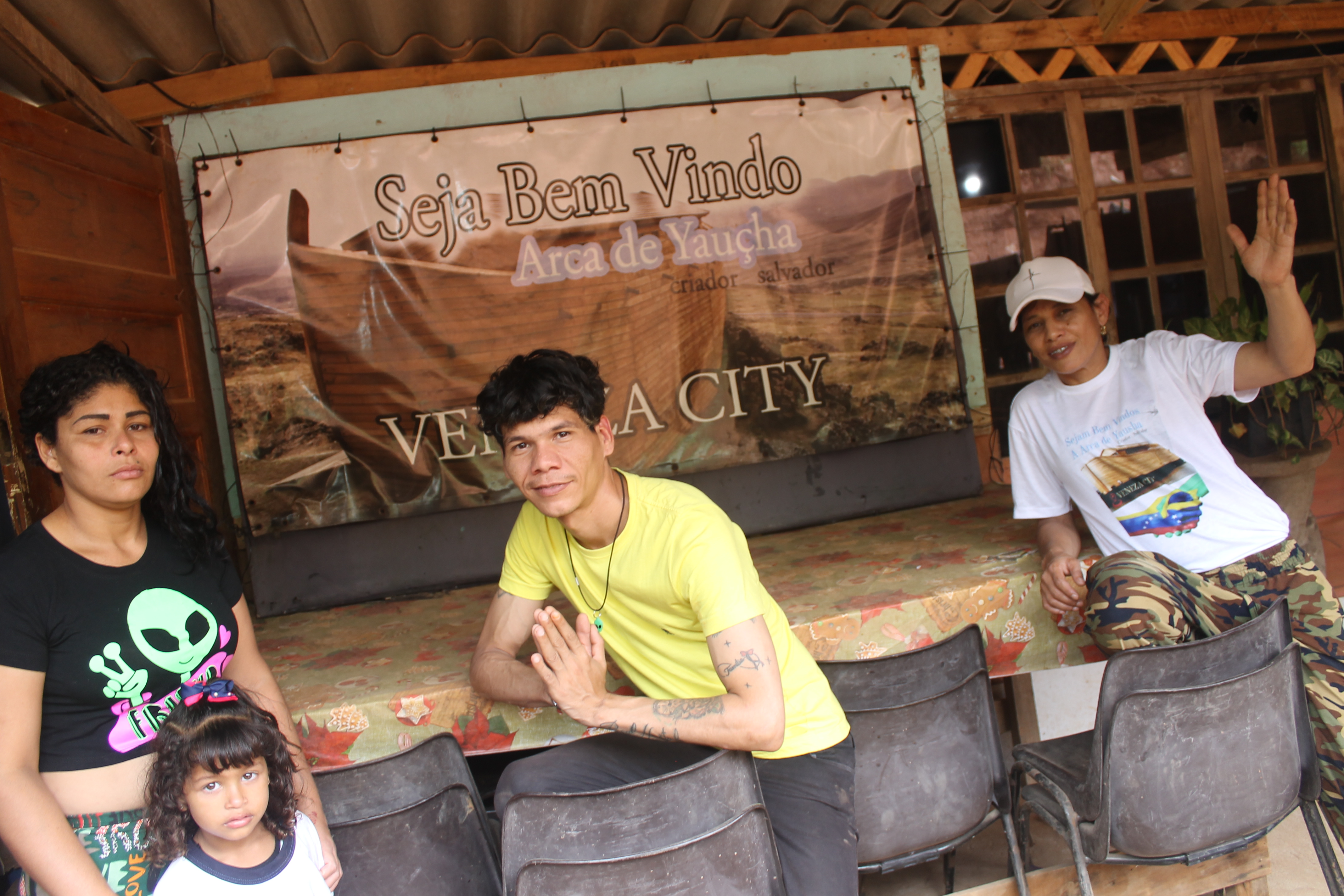 Residents of Veneza City pose for a photo