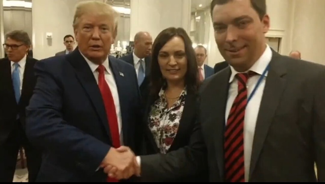 A photo of Donald Trump shaking hands with Igor.