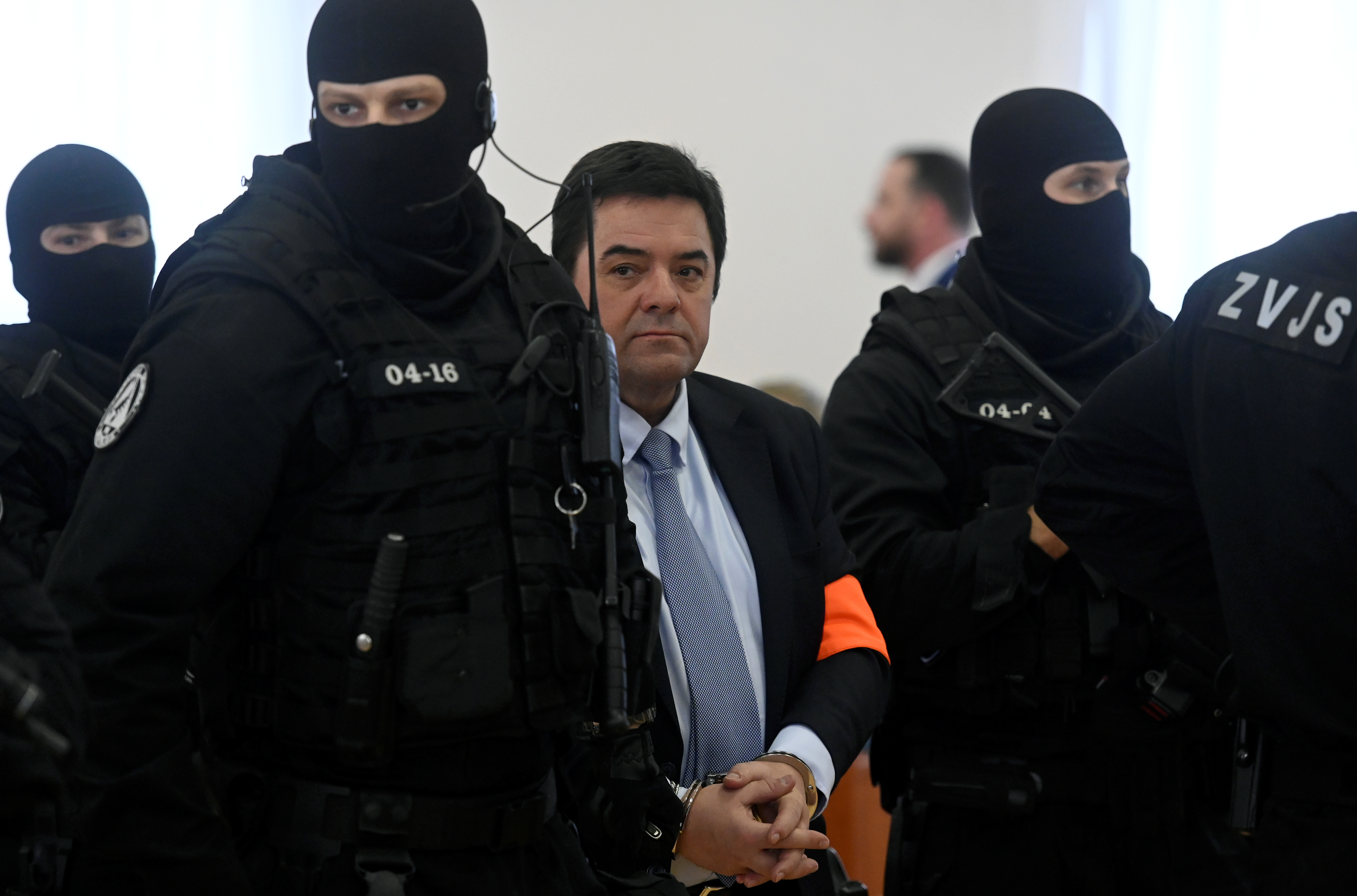 Slovak businessman Marian Kocner walks inside the courtroom