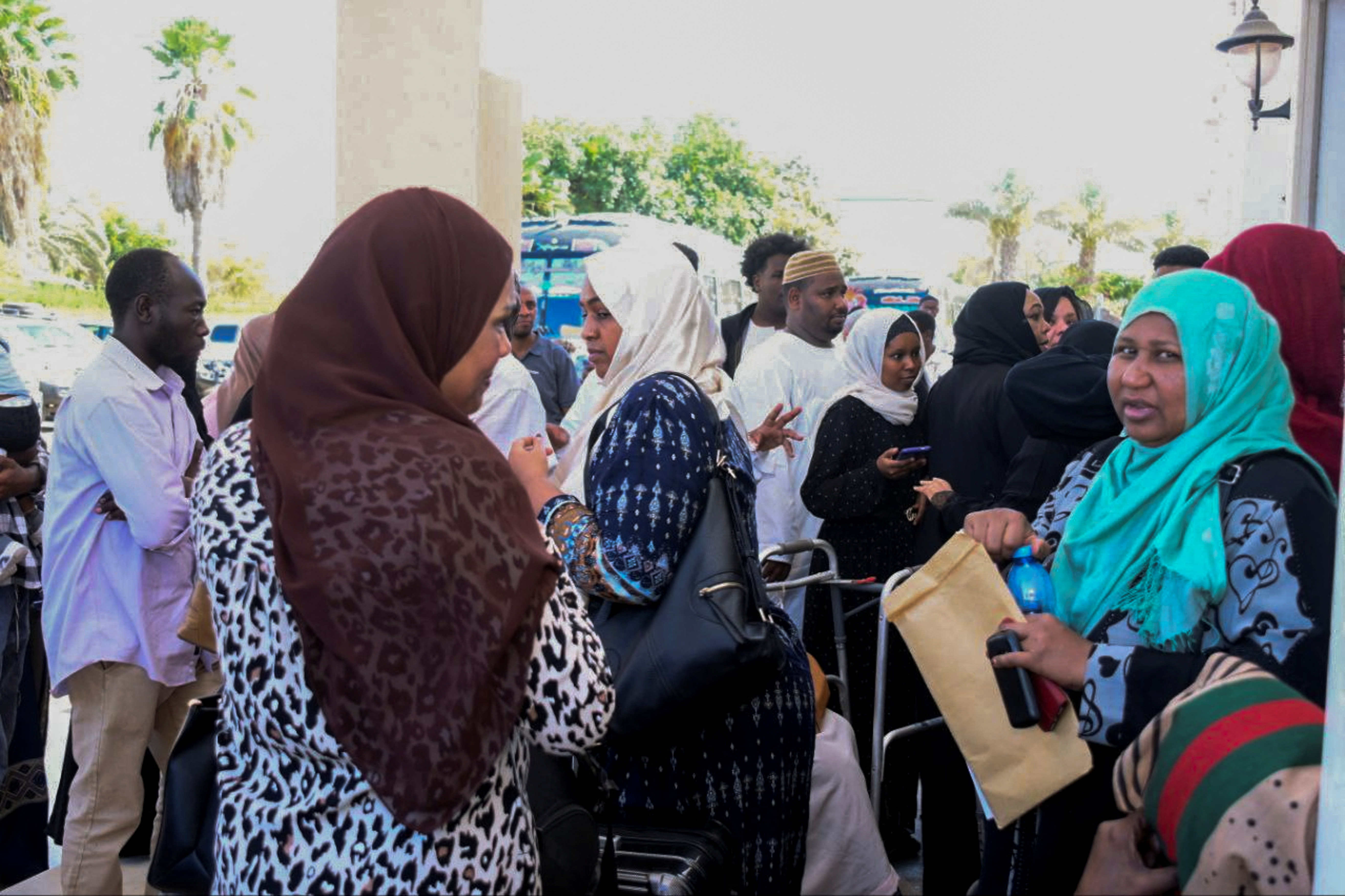 British nationals prepare for check regulations for evacuation at a hotel at the port, as clashes between the paramilitary Rapid Support Forces and the Sudanese army continue, in Port Sudan
