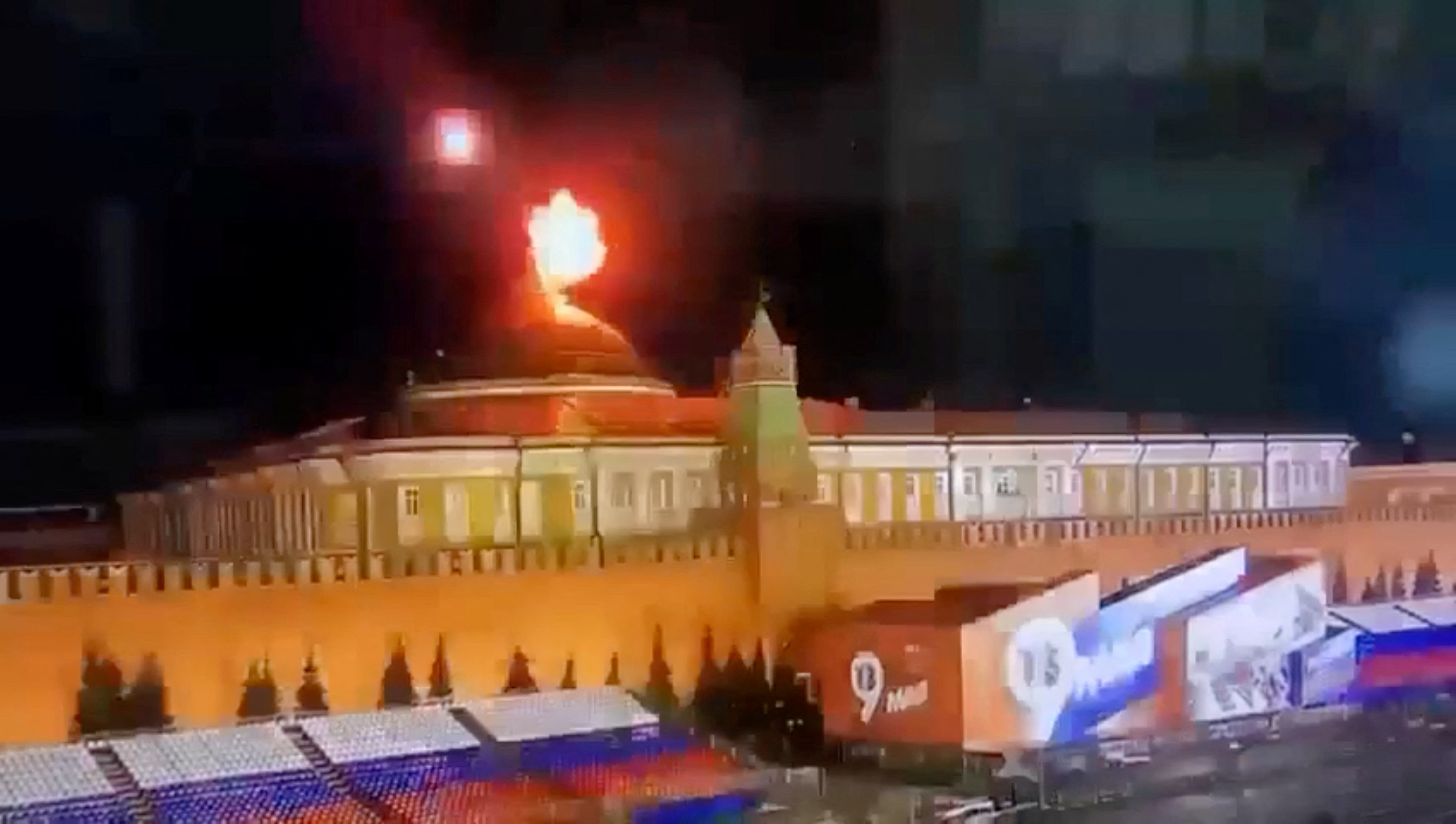 A still image taken from video shows a flying object exploding in an intense burst of light near the dome of the Kremlin Senate building during the alleged Ukrainian drone attack in Moscow, Russia, in this image taken from video obtained by Reuters May 3, 2023. Ostorozhno Novosti/Handout via REUTERS ATTENTION EDITORS - THIS IMAGE WAS PROVIDED BY A THIRD PARTY. NO RESALES. NO ARCHIVES. MANDATORY CREDIT. 