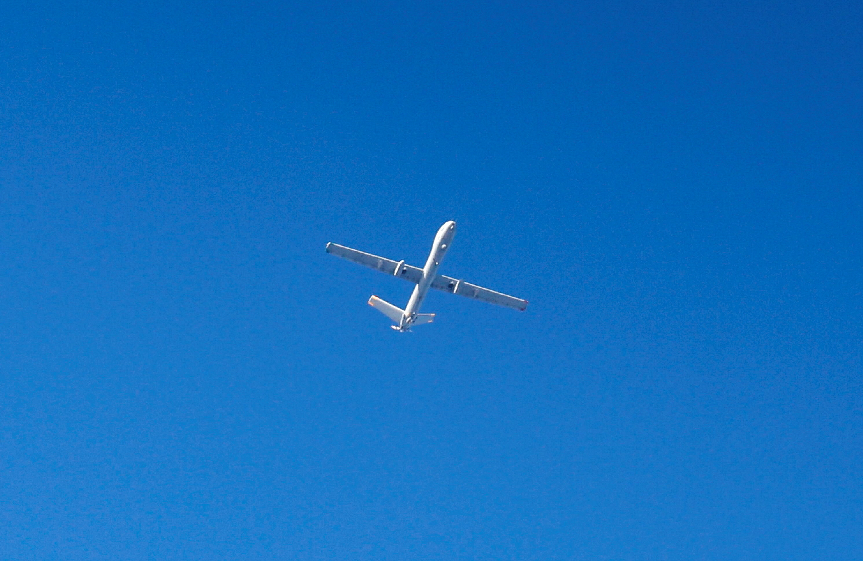 An Israeli reconnaissance unmanned aerial vehicle flies over Khan Younis, in the aftermath of Israeli military strikes on Islamic Jihad targets, in the southern Gaza Strip, May 9, 2023. REUTERS/Ibraheem Abu Mustafa