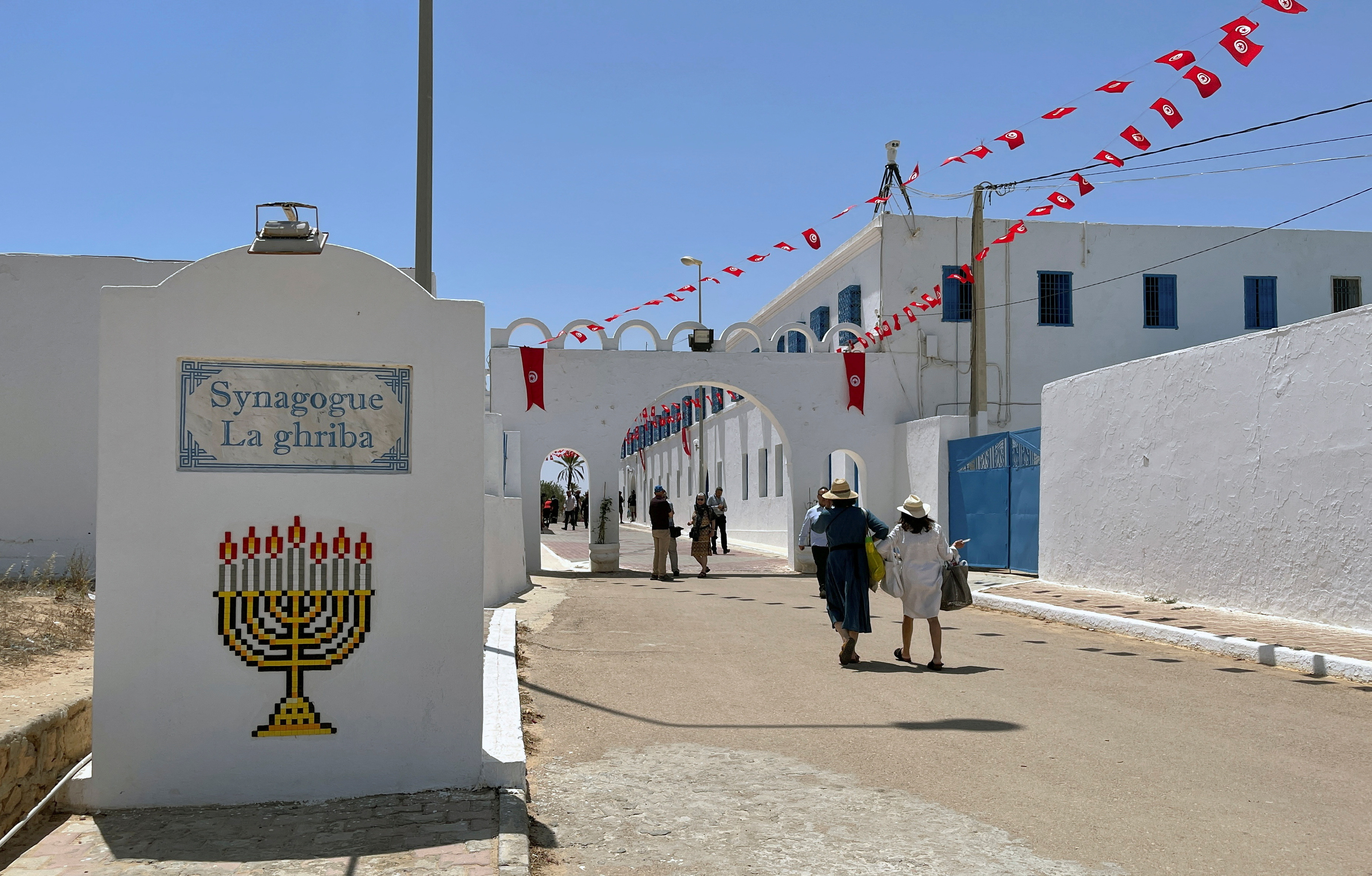 FILE PHOTO: Jewish worshippers arrive at the Ghriba synagogue, during an annual pilgrimage in Djerba, Tunisia May 18, 2022. Picture taken May 18, 2022. REUTERS/Jihed Abidellaoui/File Photo