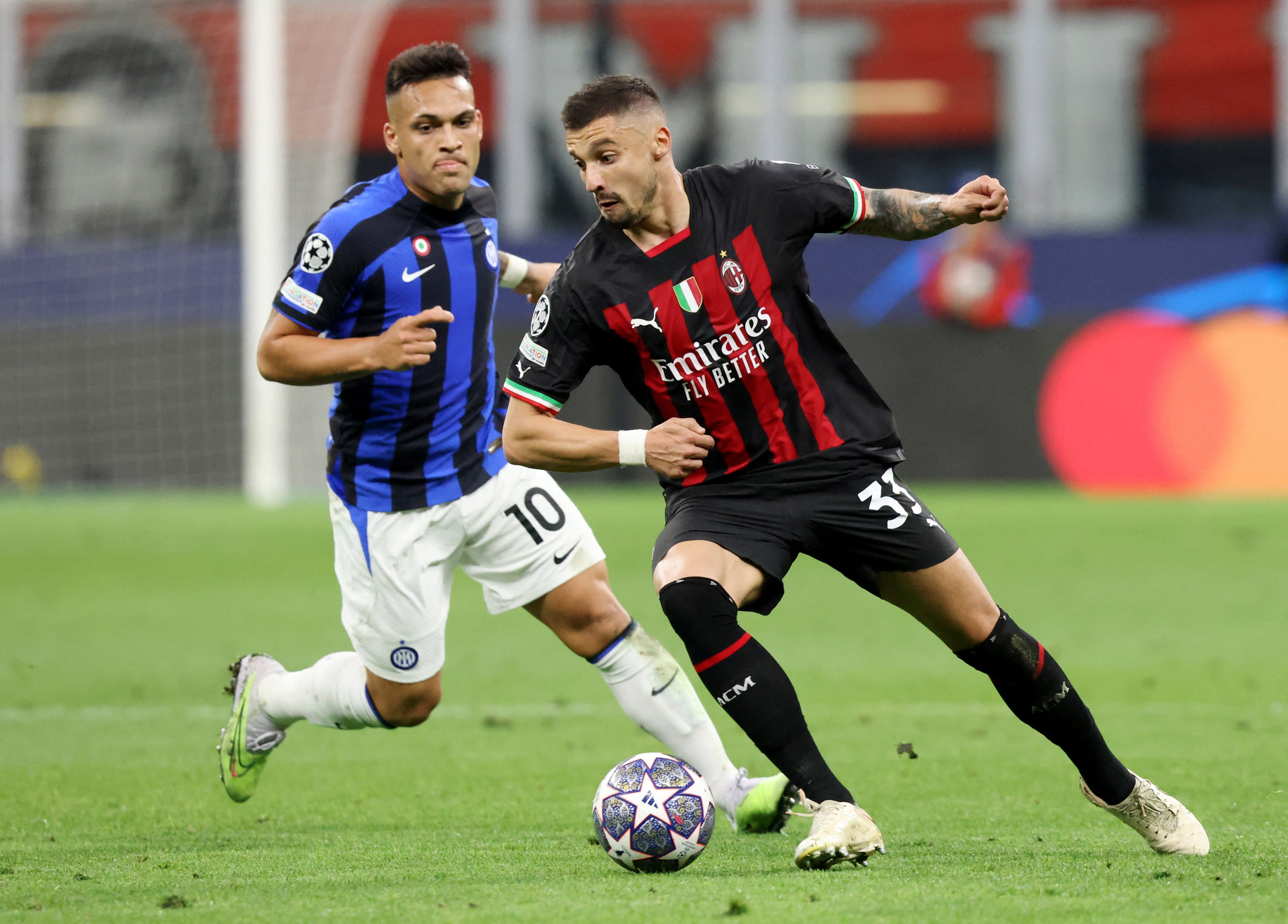 Inter Milan's Lautaro Martinez in action with AC Milan's Rade Krunic
