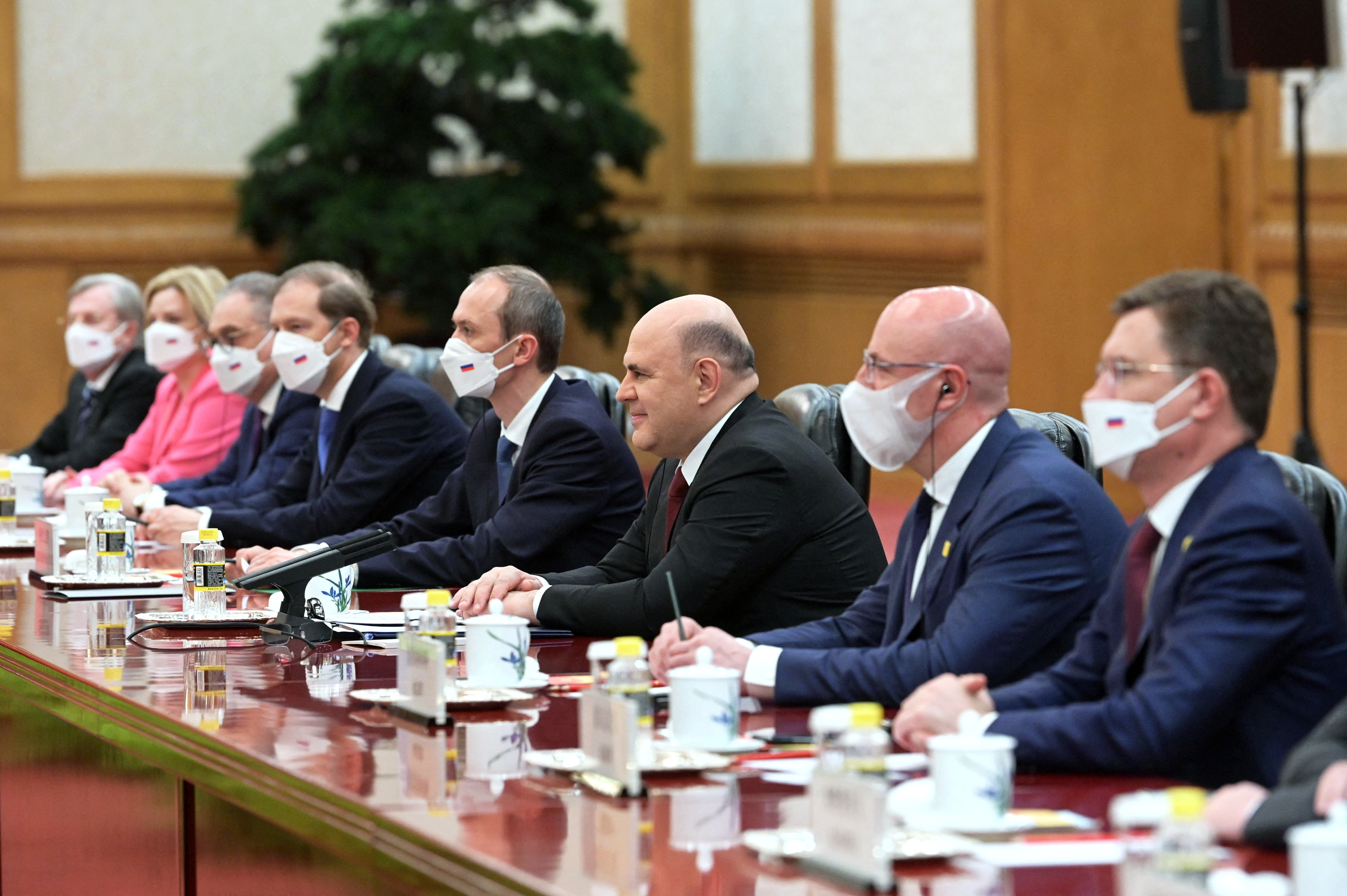 Russian Prime Minister Mikhail Mishustin attends a meeting with Chinese President Xi Jinping at the Great Hall of the People in Beijing, China May 24, 2023. Sputnik/Alexander Astafyev/Pool via REUTERS ATTENTION EDITORS - THIS IMAGE WAS PROVIDED BY A THIRD PARTY.