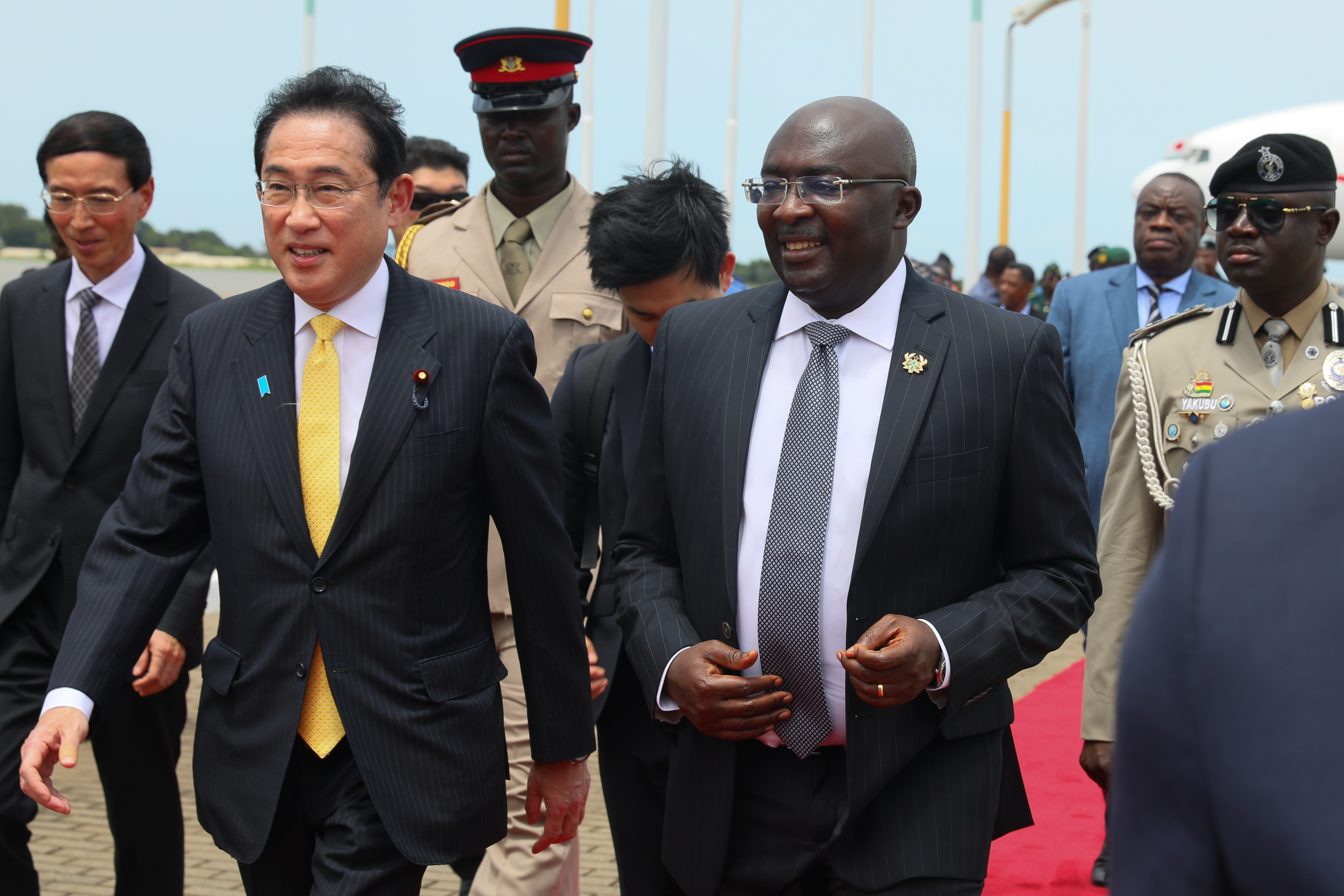 Japan's Prime Minister Fumio Kishida (L) walks with Ghanas Vice President Mahamudu Bawumia(R) after arriving at the Kotoka International Airport in Accra, Ghana on May 1, 2023. (Photo by Nipah Dennis / AFP)