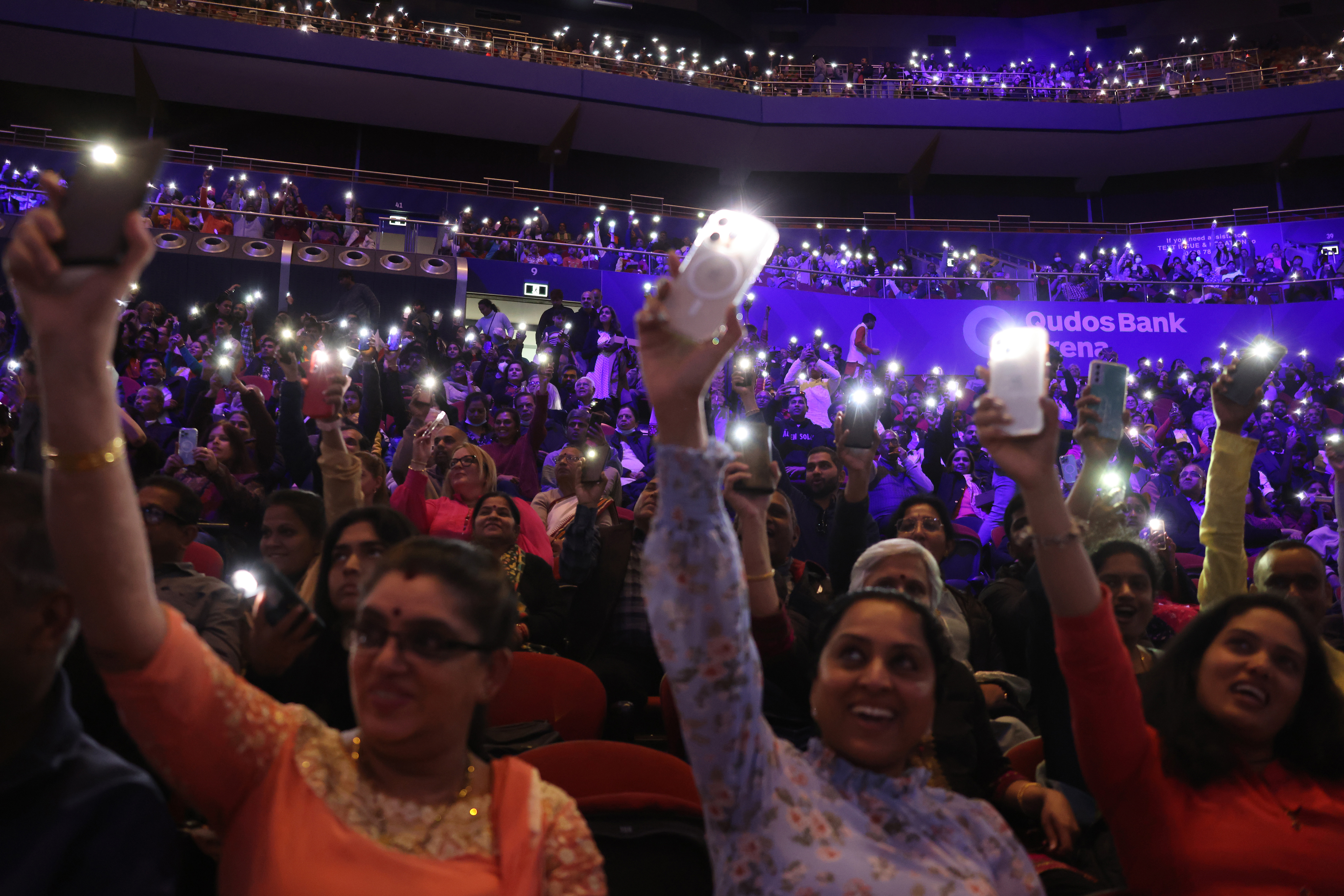 Members of the local Indian community welcome Australias Prime Minister Anthony Albanese and India's Prime Minister Narendra Modi during an event at the Qudos Arena in Sydney on May 23