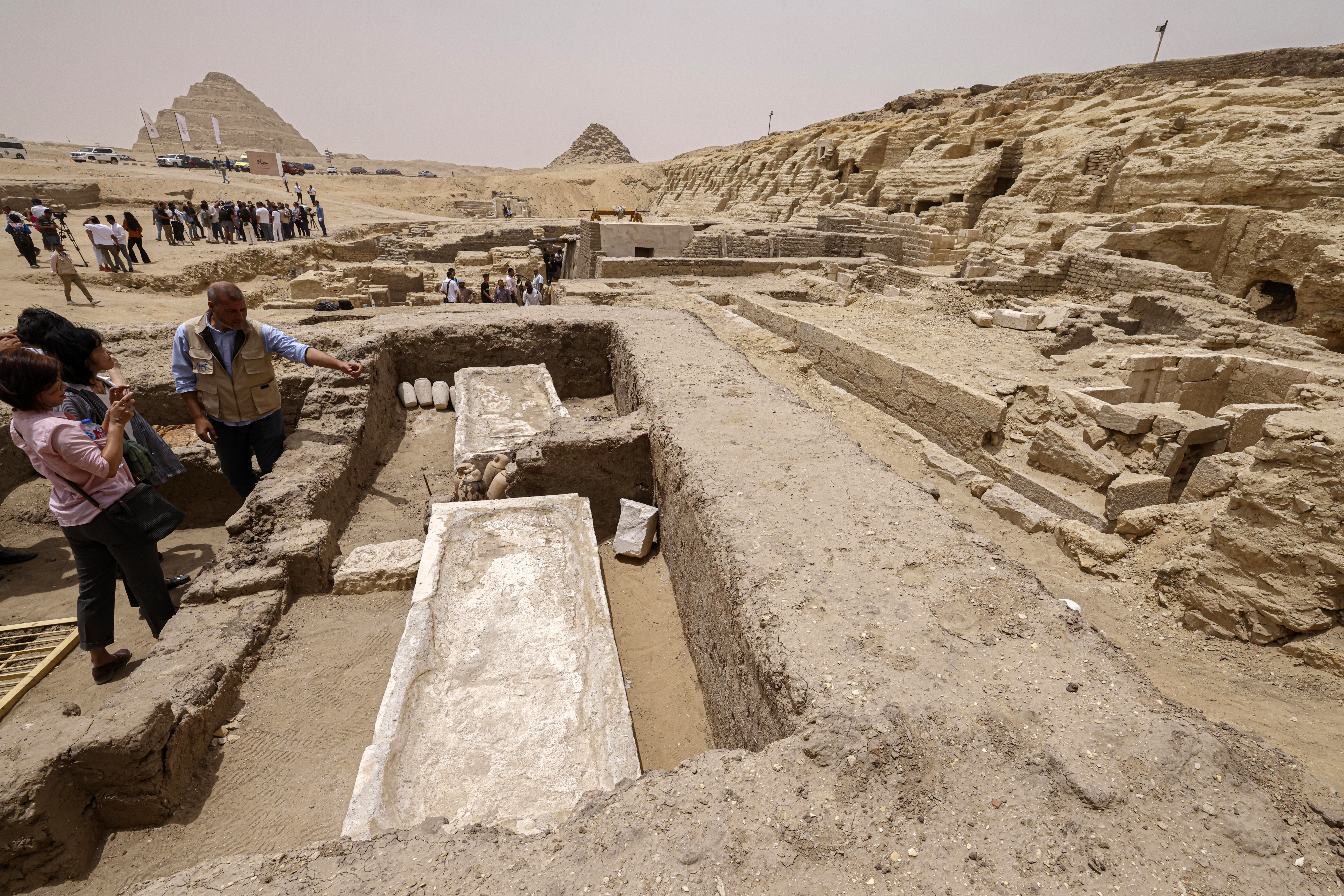 Visitors tour the site in the Saqqara necropolis south of Cairo