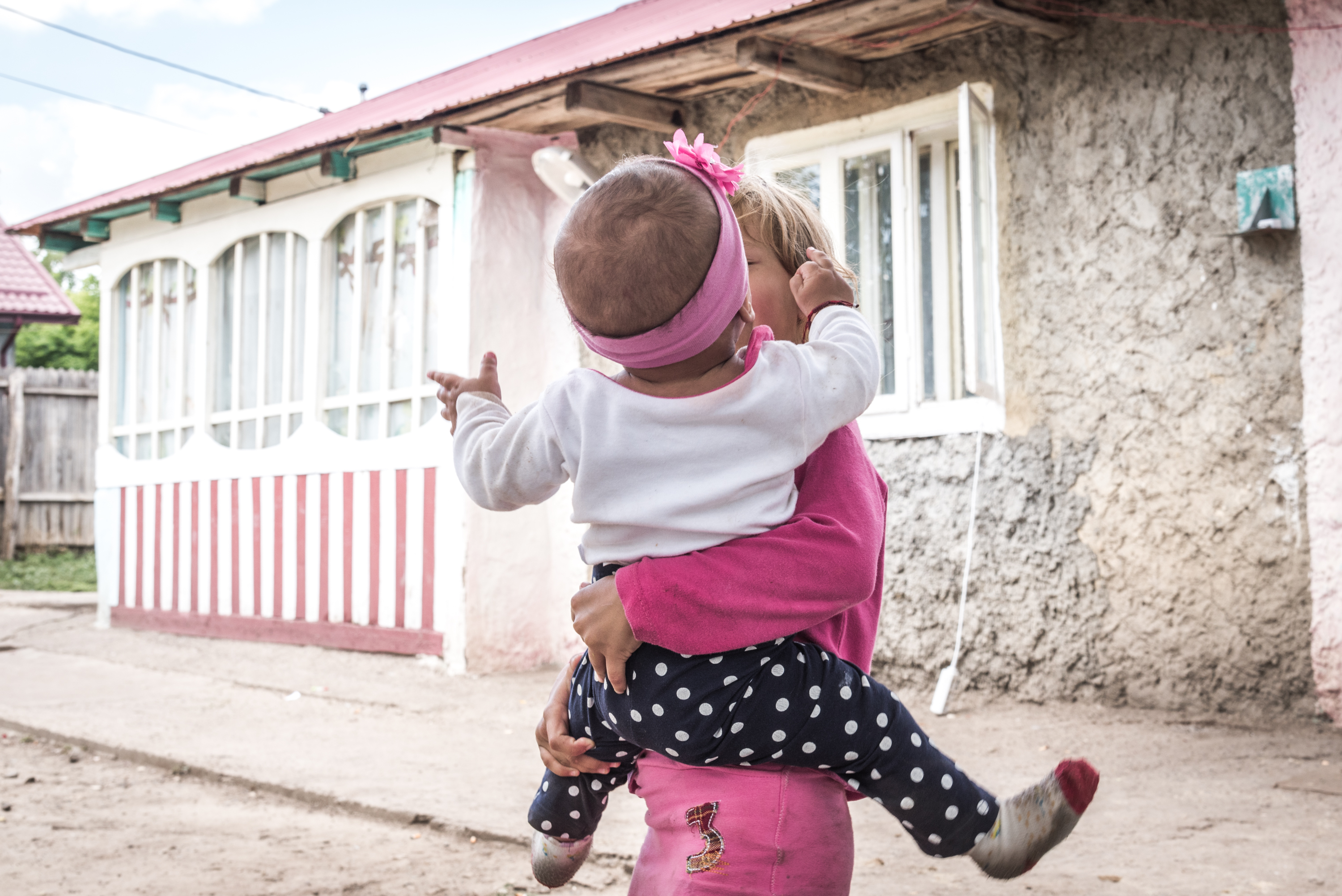 Alina holds her eight-month-old nephew, Ion.