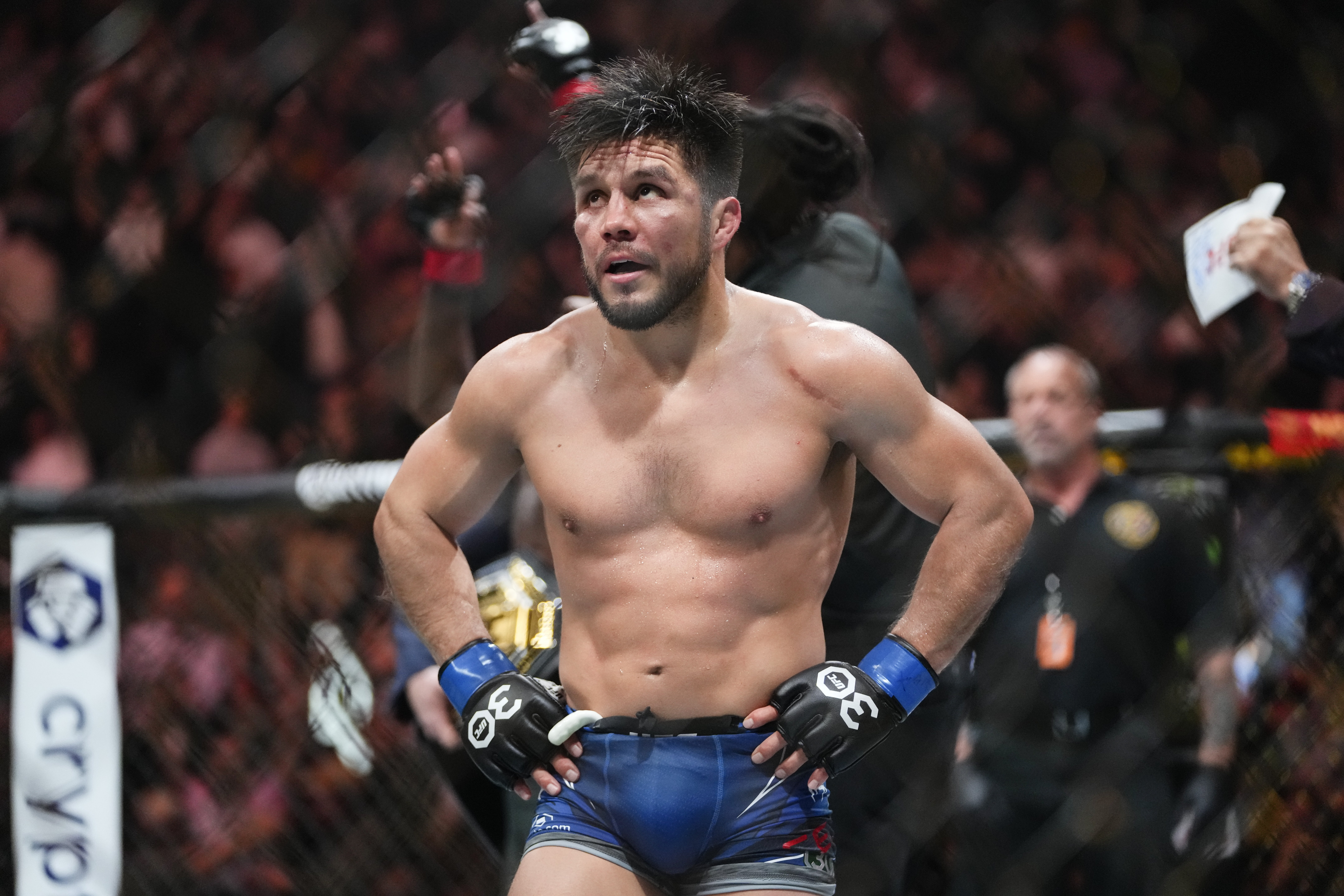 Henry Cejudo reacts after losing to Aljamain Sterling