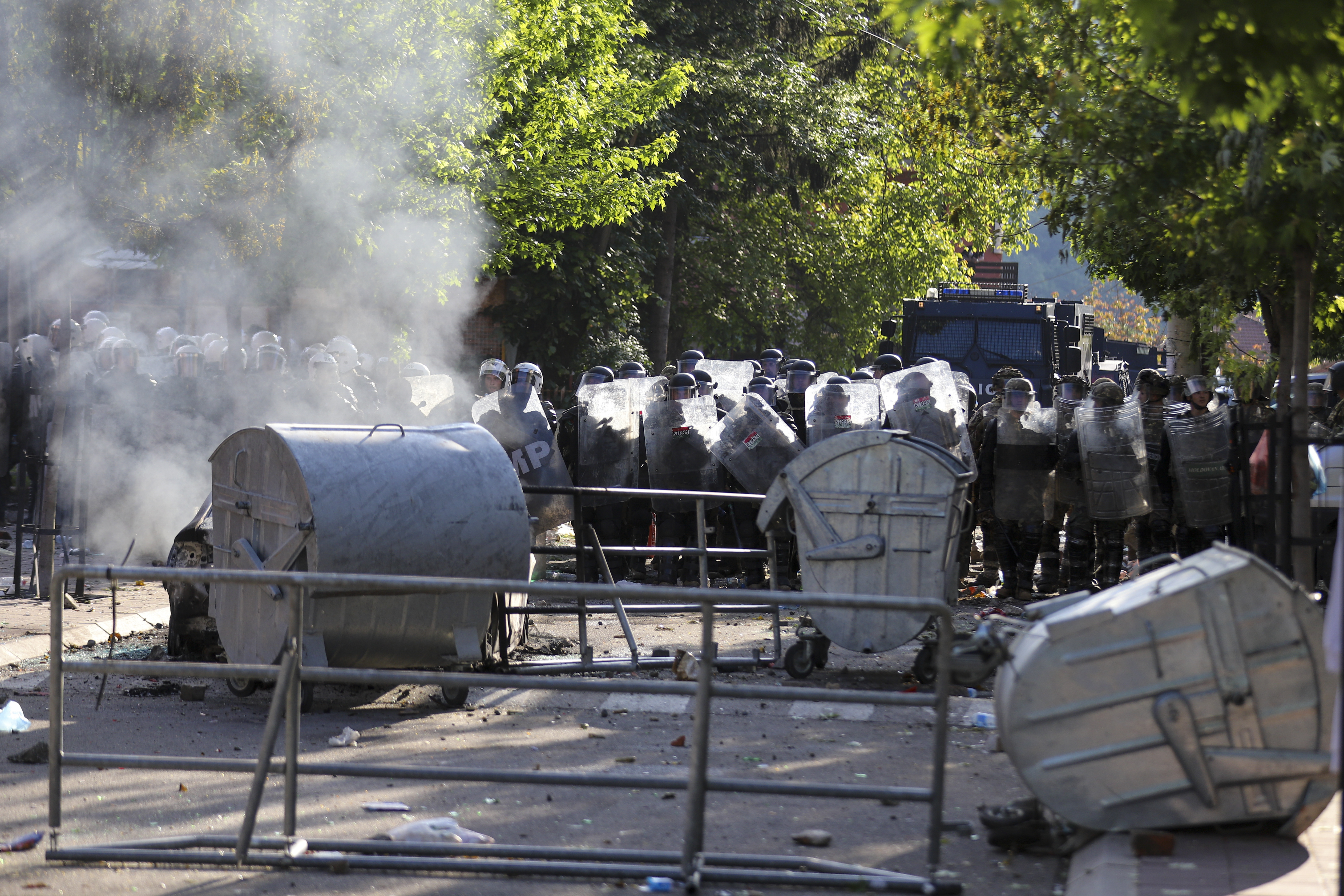 KFOR soldiers guard a municipal building after clashes with Kosovo Serbs in the town of Zvecan,