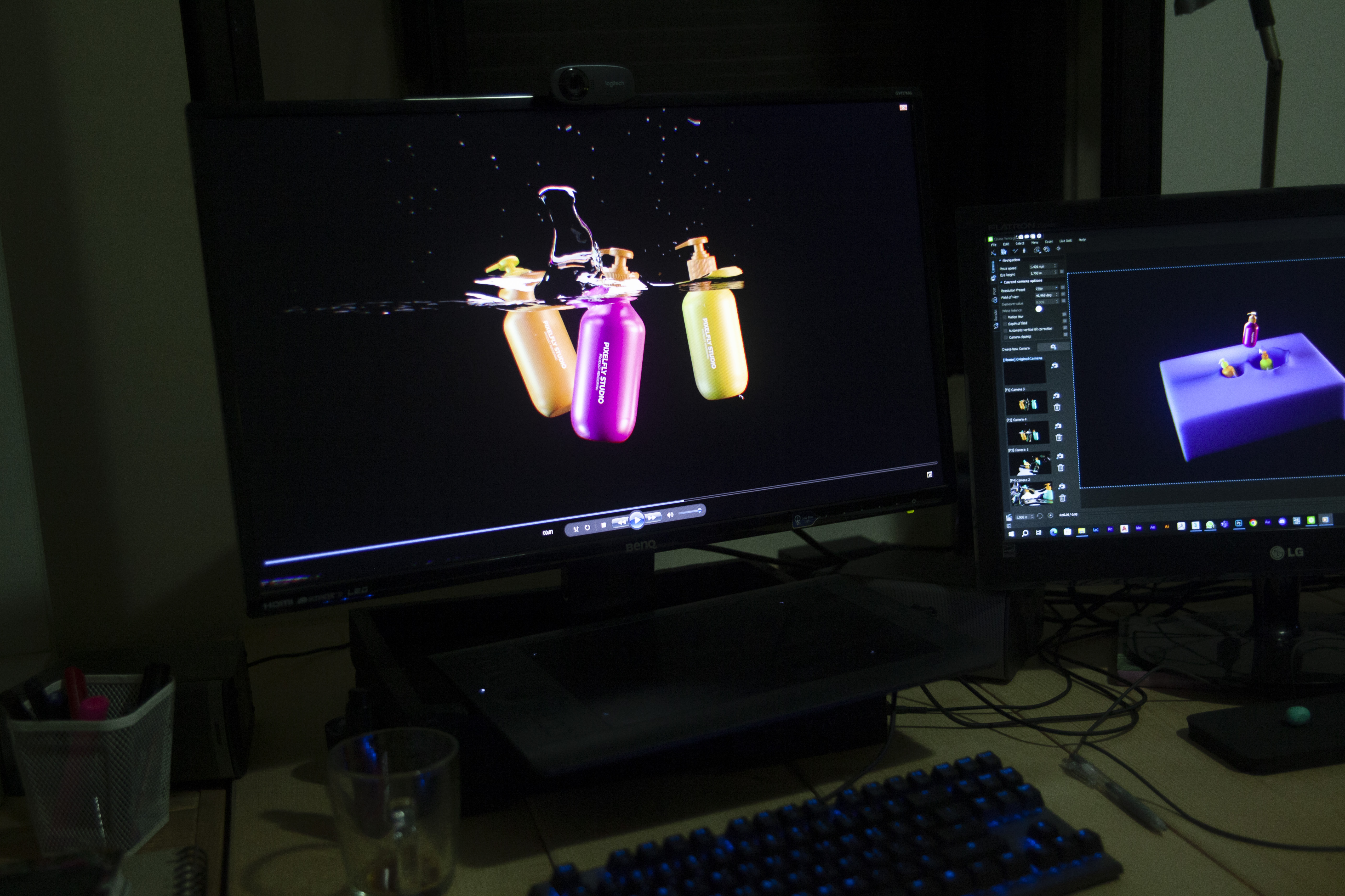 A photo of a computer screen with a video of three soap dispensers next to each other with water splashing around it.