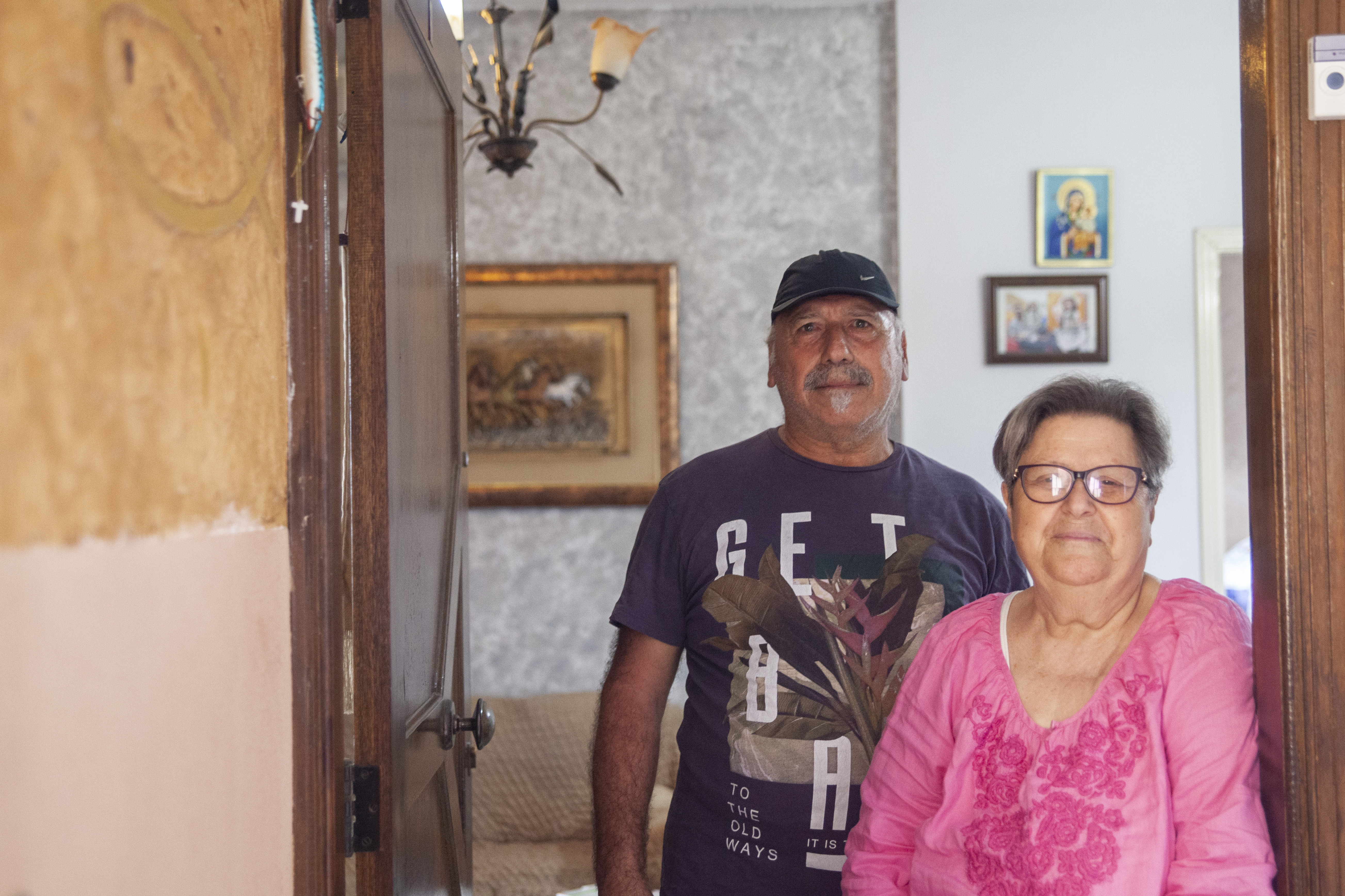 A photo of Chadi's father standing next to but slightly behind his mother.