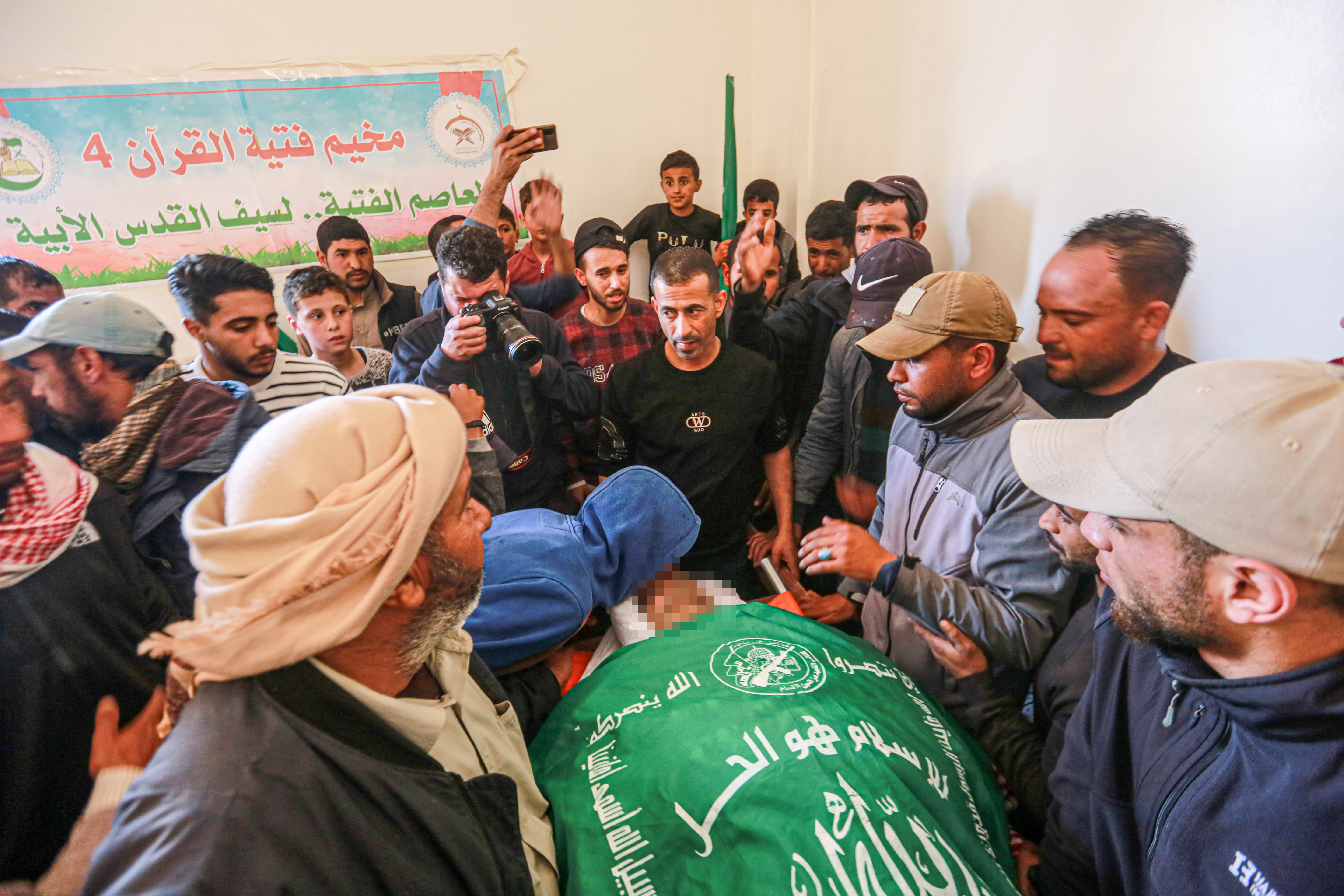 Family of Hashel Al Swerki, 58, who was killed in an Israeli bombing near his home last night, bids him farewell_-1683179320