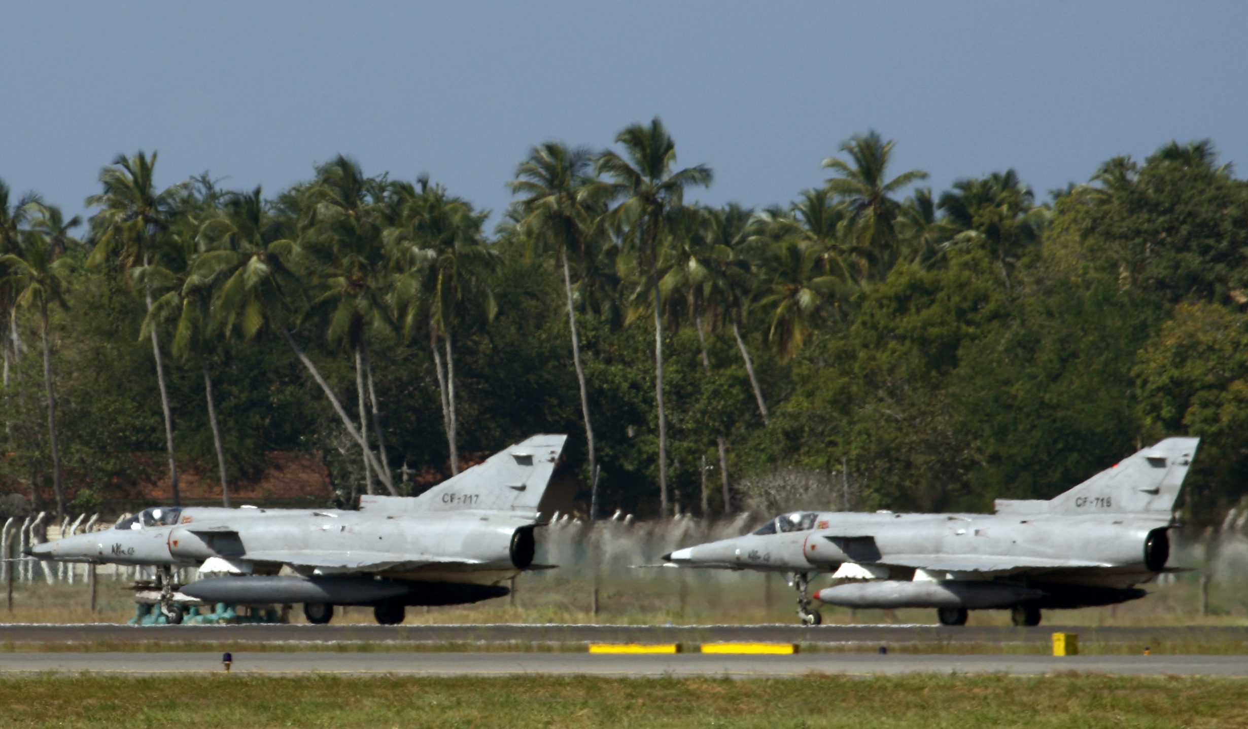 Sri Lankan Air Force's Kfir fighters prepare to take off at Bandaranaike International Airport, near Colombo January 2, 2009. Sri Lankan troops fought their way into the Tamil Tigers' de facto capital of Kilinochchi and the entire town will soon be under government control, an official said on Friday, in what would be a major blow for the rebels. REUTERS/Buddhika Weerasinghe (SRI LANKA)