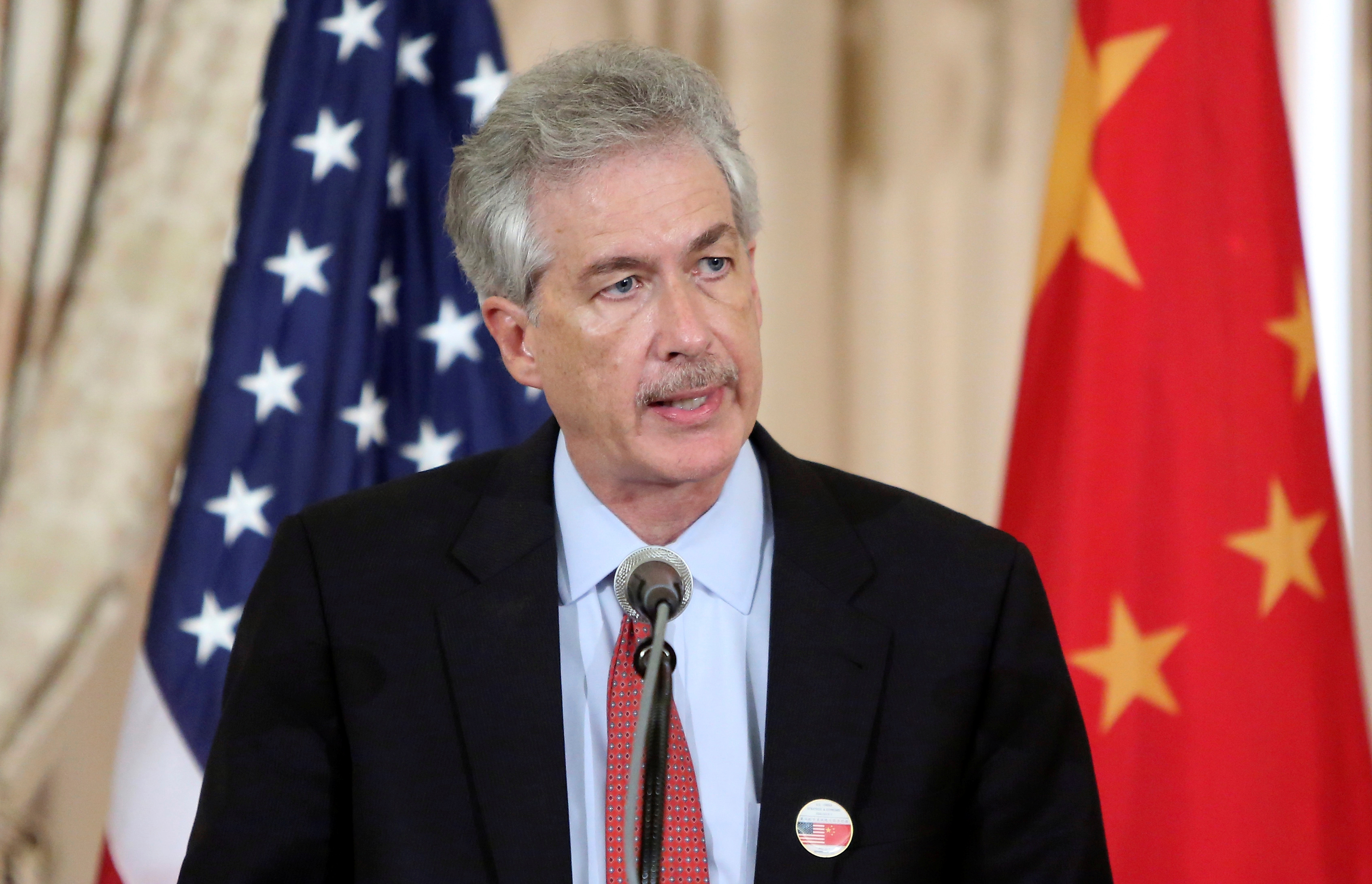 FILE PHOTO: U.S. Deputy Secretary of State William Burns makes remarks at the start of the Ecopartnership event of the U.S.-China Strategic and Economic Dialogue (S&amp;ED) at the State Department in Washington July 11, 2013. REUTERS/Jonathan Ernst/File Photo
