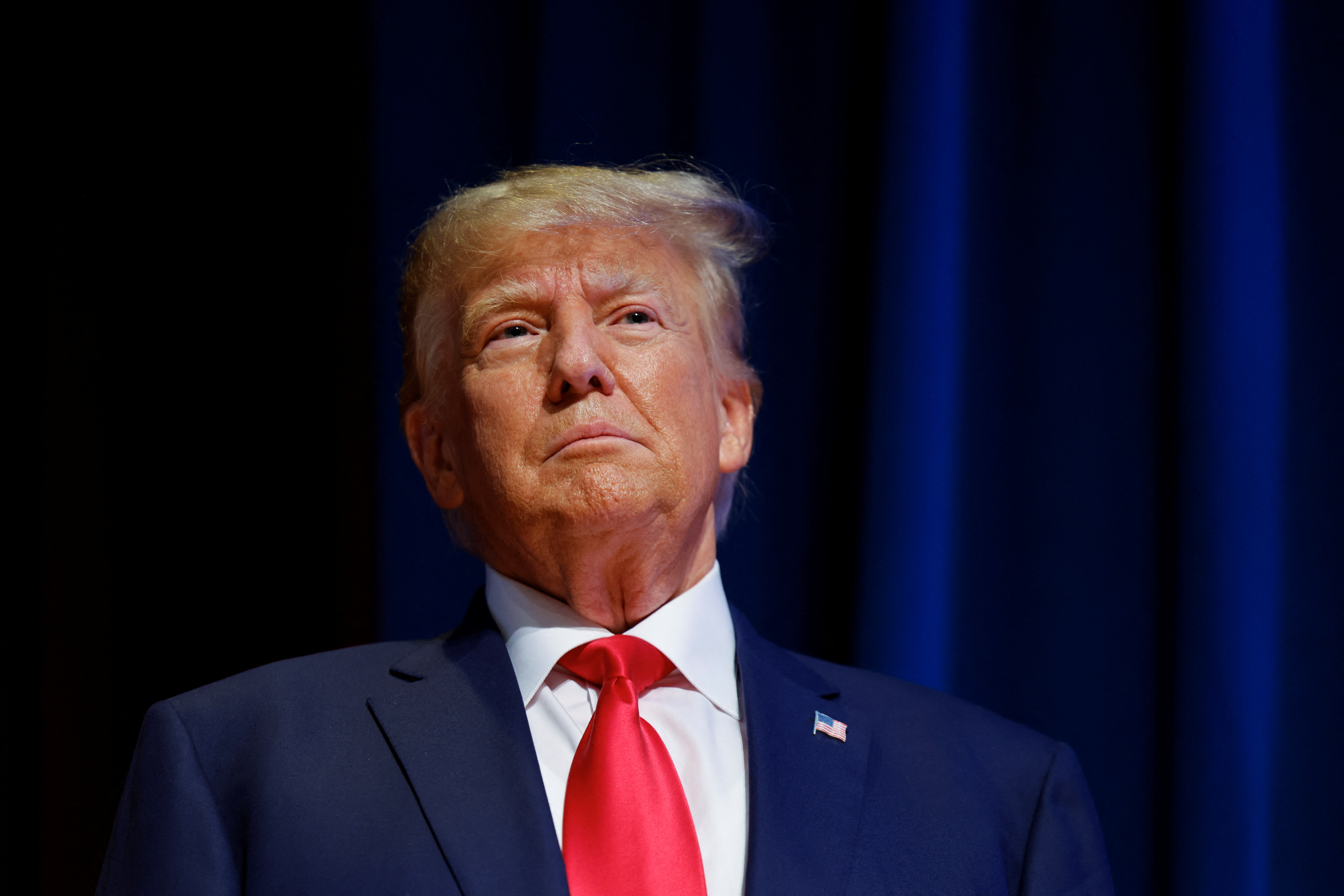 Former U.S. President and Republican presidential candidate Donald Trump looks on as he attends the North Carolina Republican Party convention in Greensboro, North Carolina