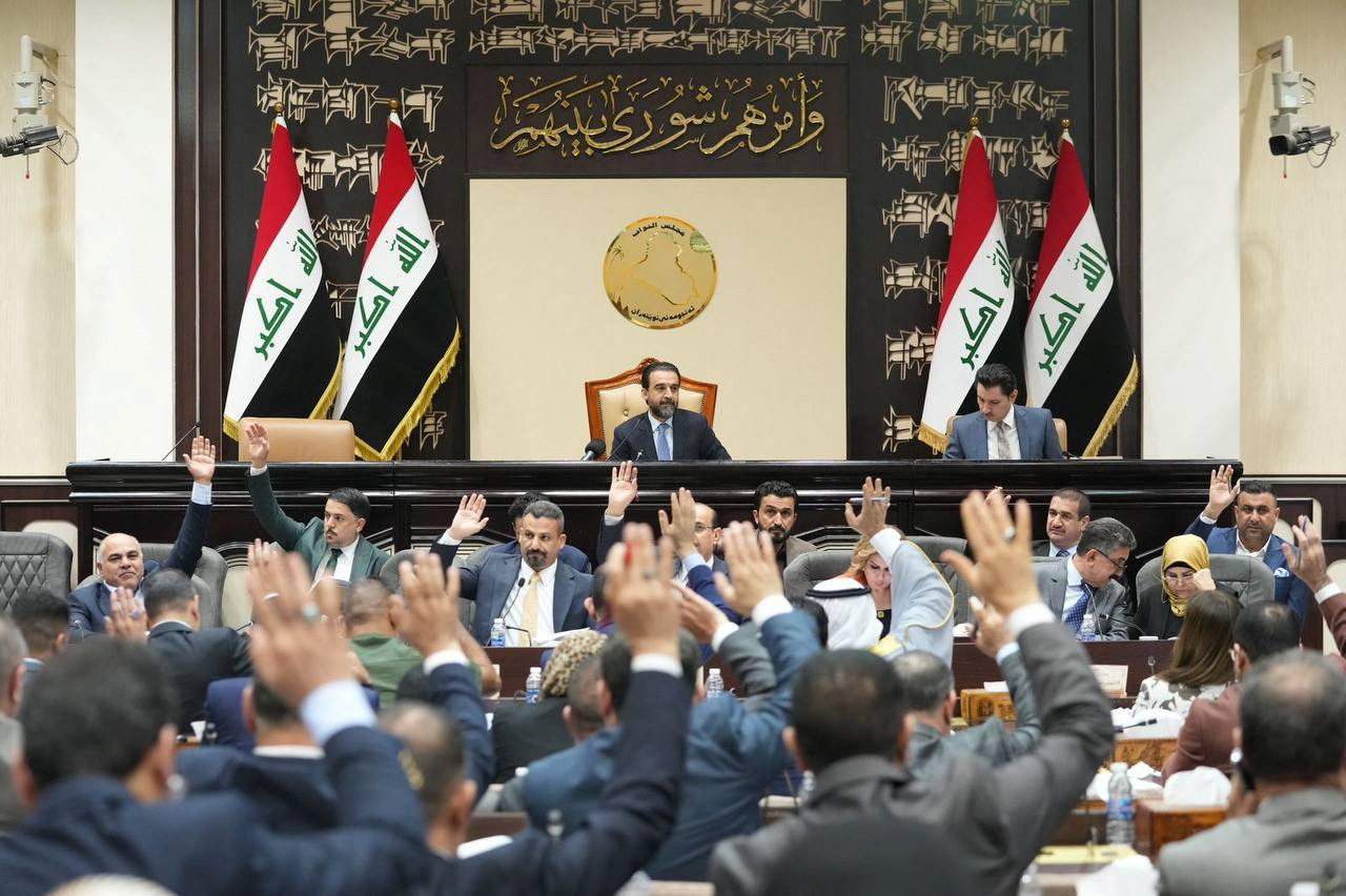 Iraqi legislators attend a parliamentary session to vote on the federal budget in Baghdad on June 11, 2023 [Parliament Media Office/Handout via Reuters]