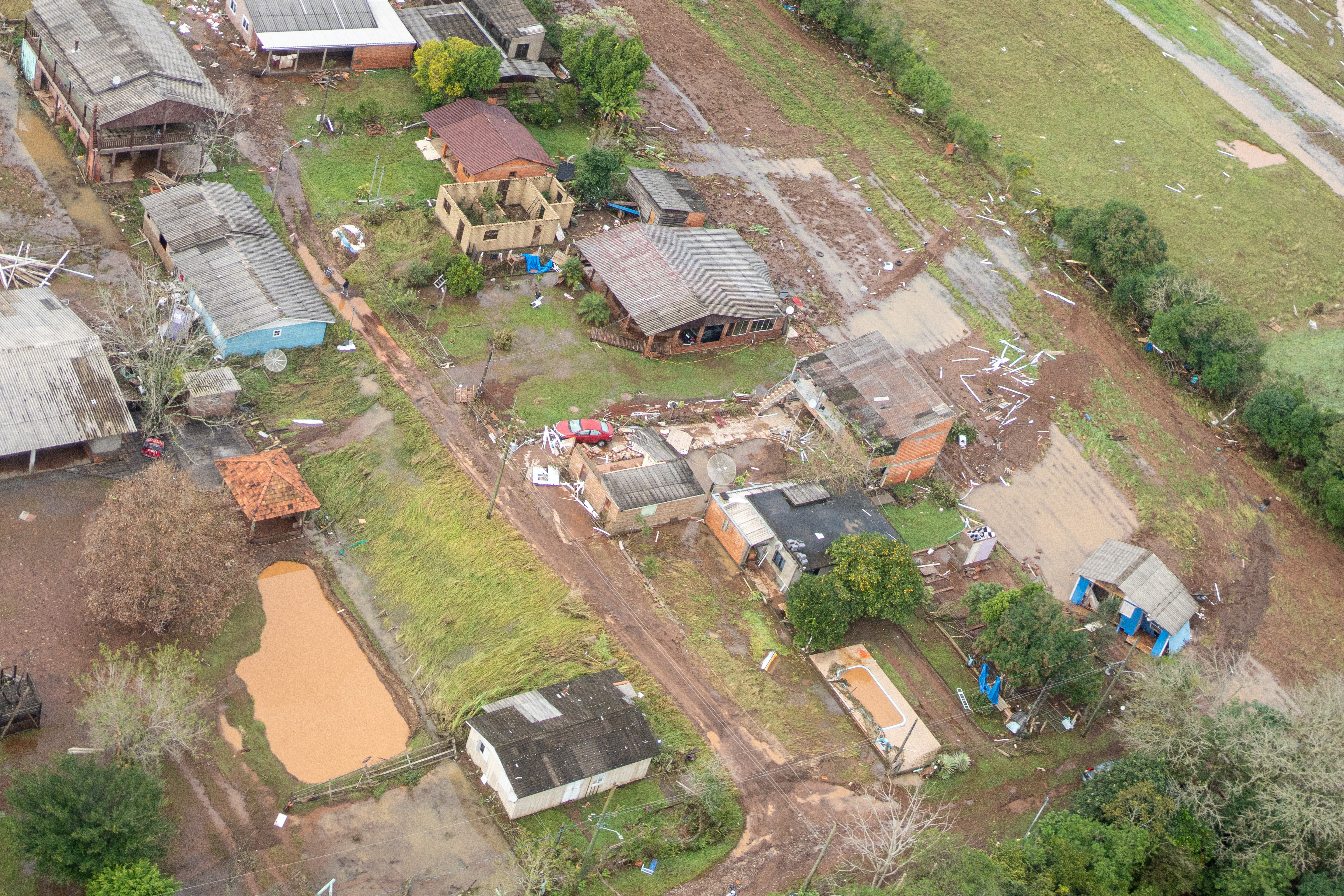 An aerial view shows damage and floods due to heavy rains in Caraa