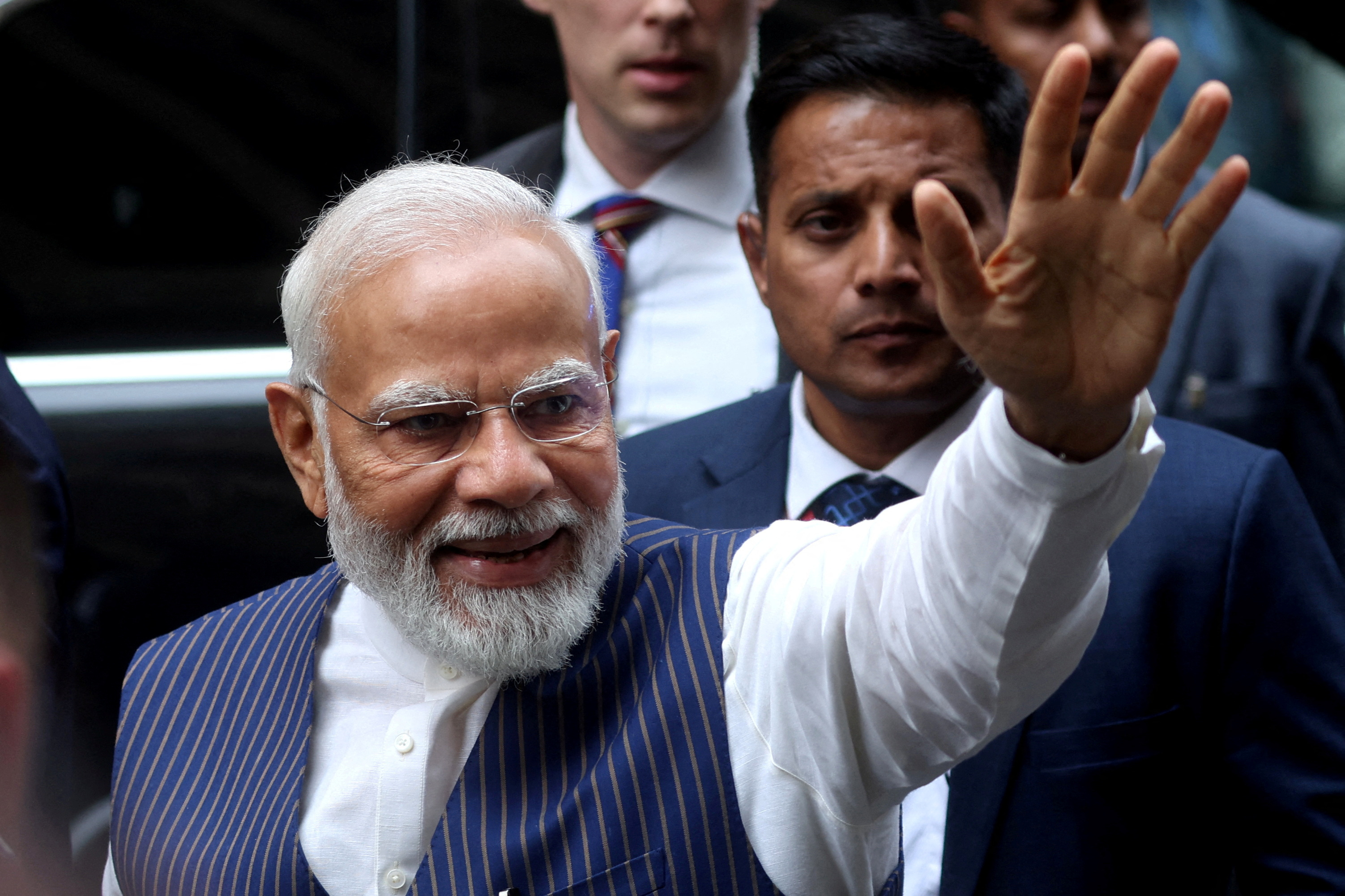 Indian Prime Minister Narendra Modi waves to supporters as he arrives at a hotel in New York City, New York, U.S., June 20, 2023