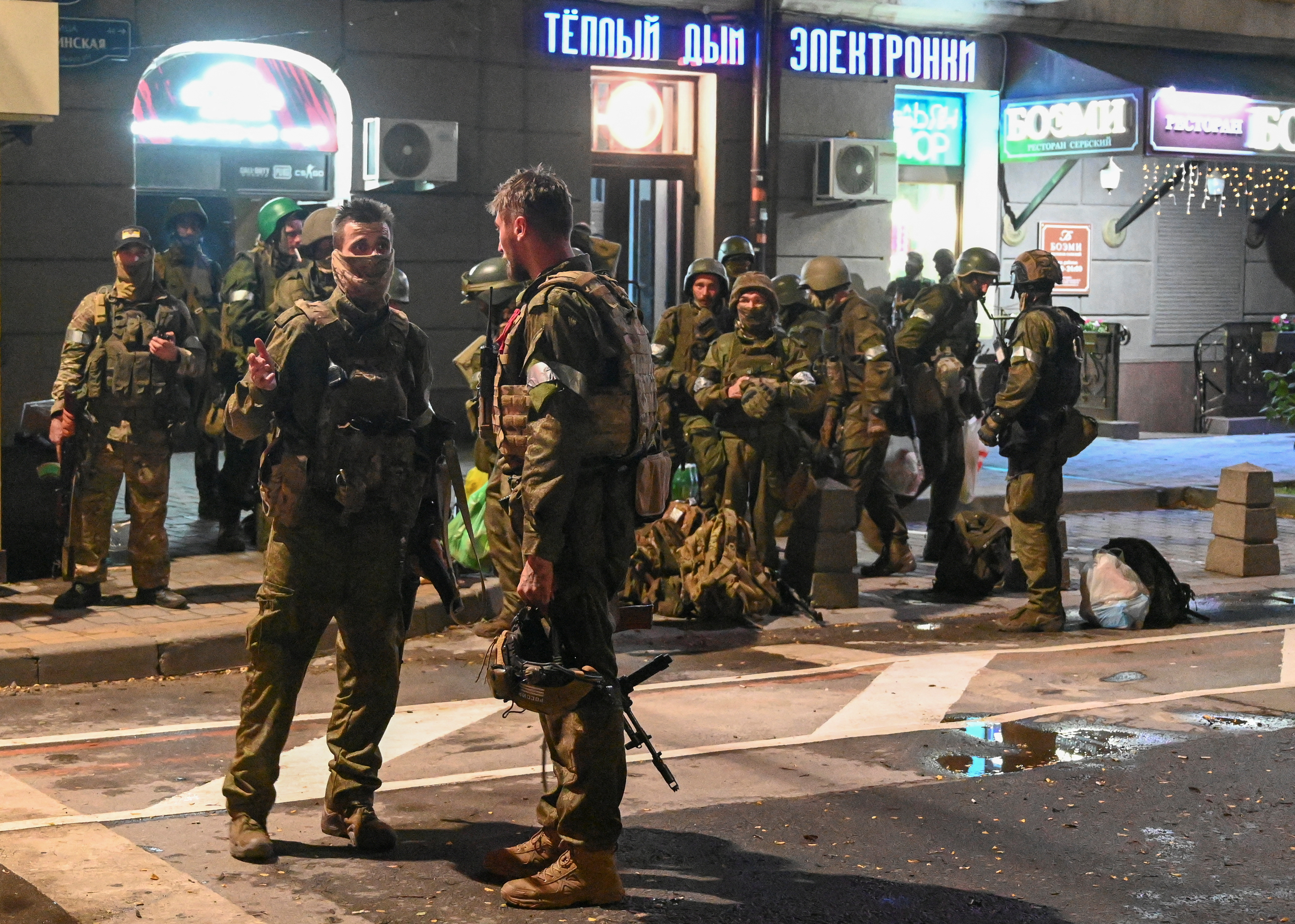 Fighters of Wagner private mercenary group pull out of the headquarters of the Southern Military District to return to base, in the city of Rostov-on-Don