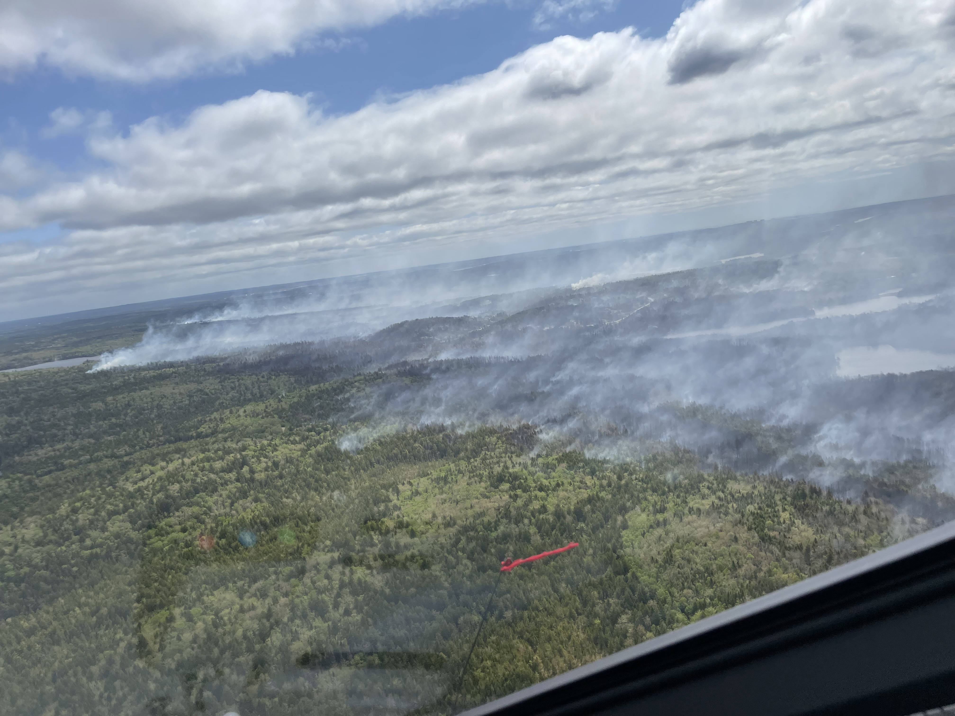 In this May 29, 2023, aerial image courtesy of the Nova Scotia Government in Canada, smoke rises from the Tantallon wildfire,
