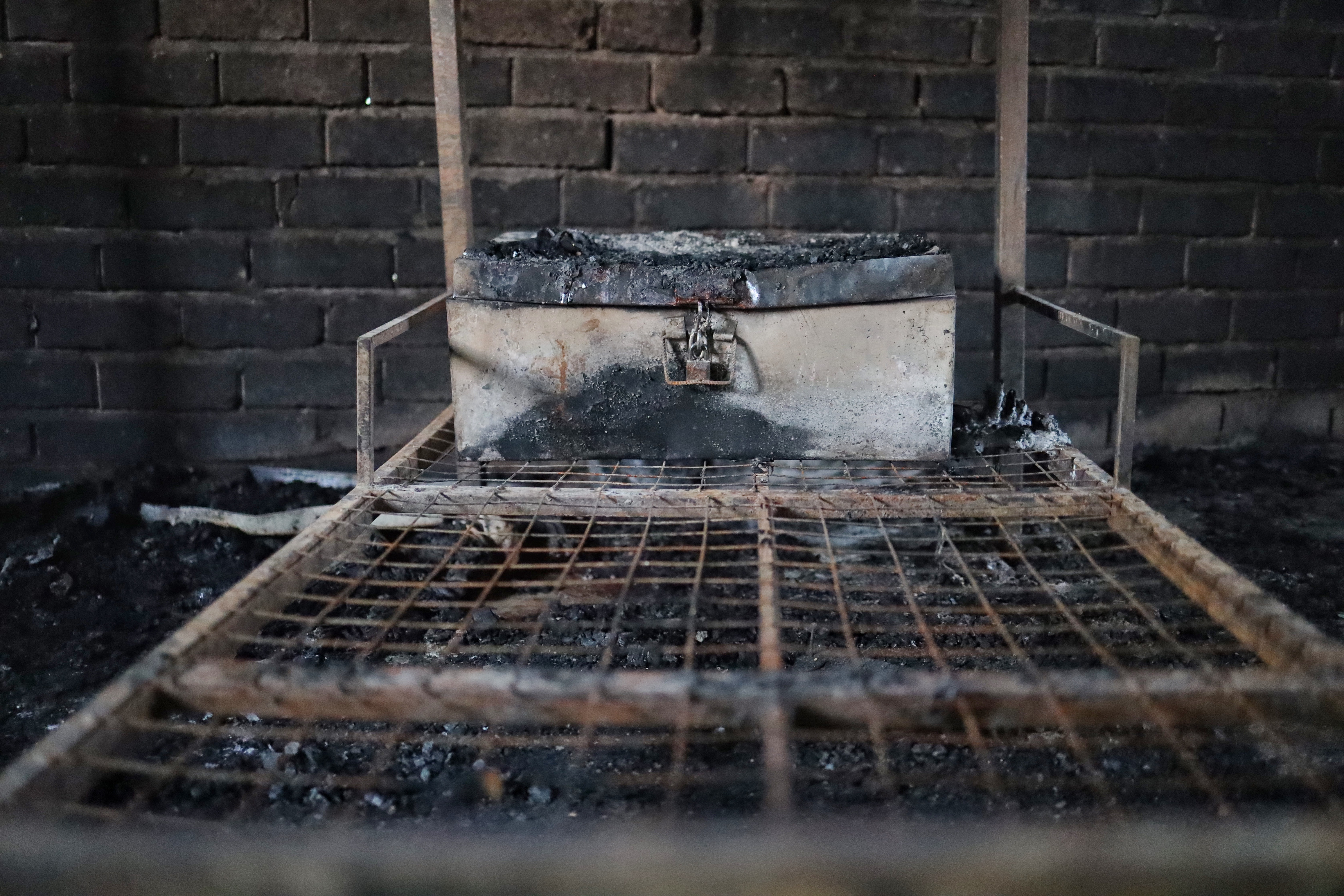 The charred remains of a bed