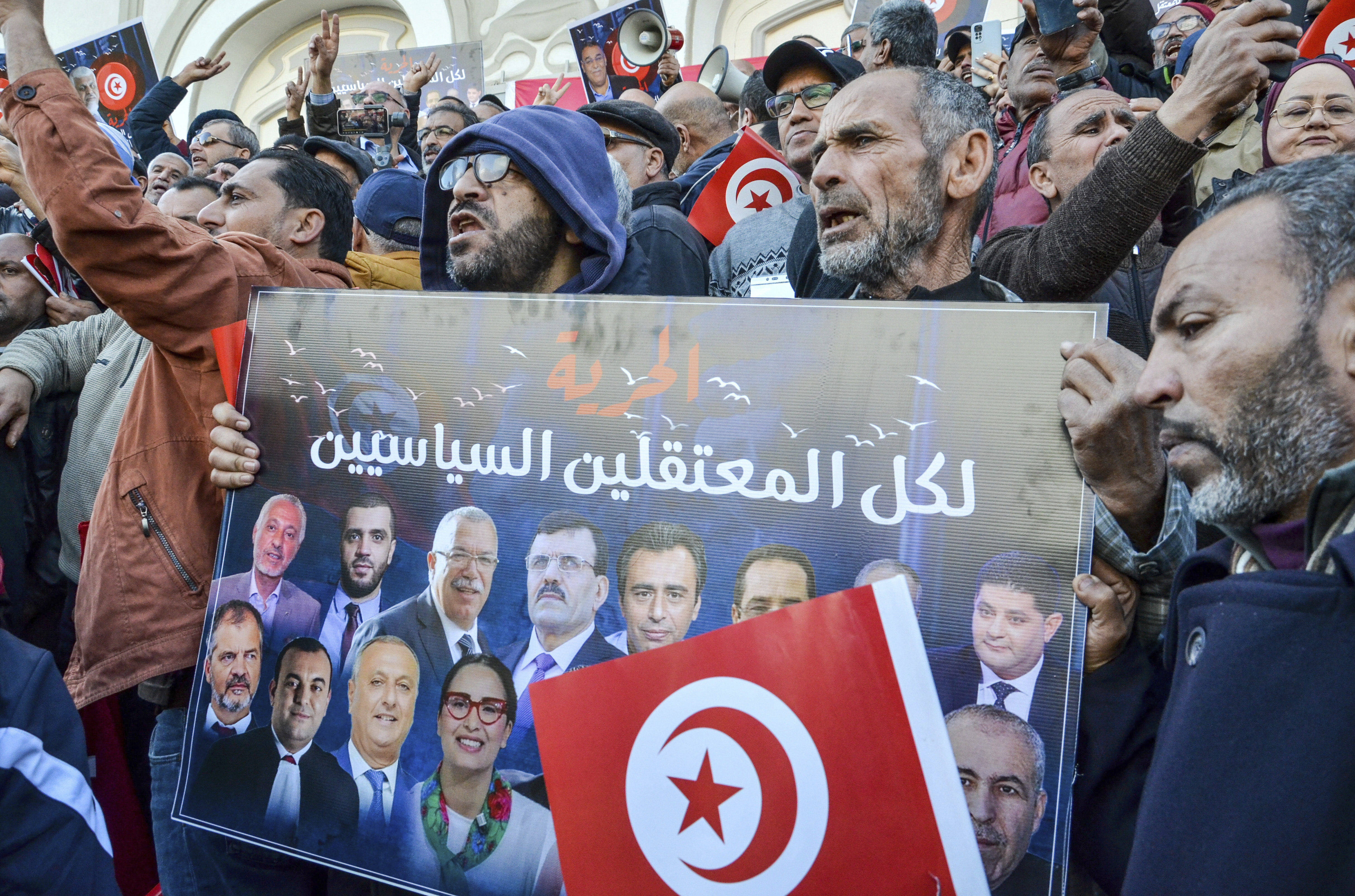 People take part in a protest against president Kais Saied policies, in Tunis, Tunisia, Sunday, March 5, 2023.