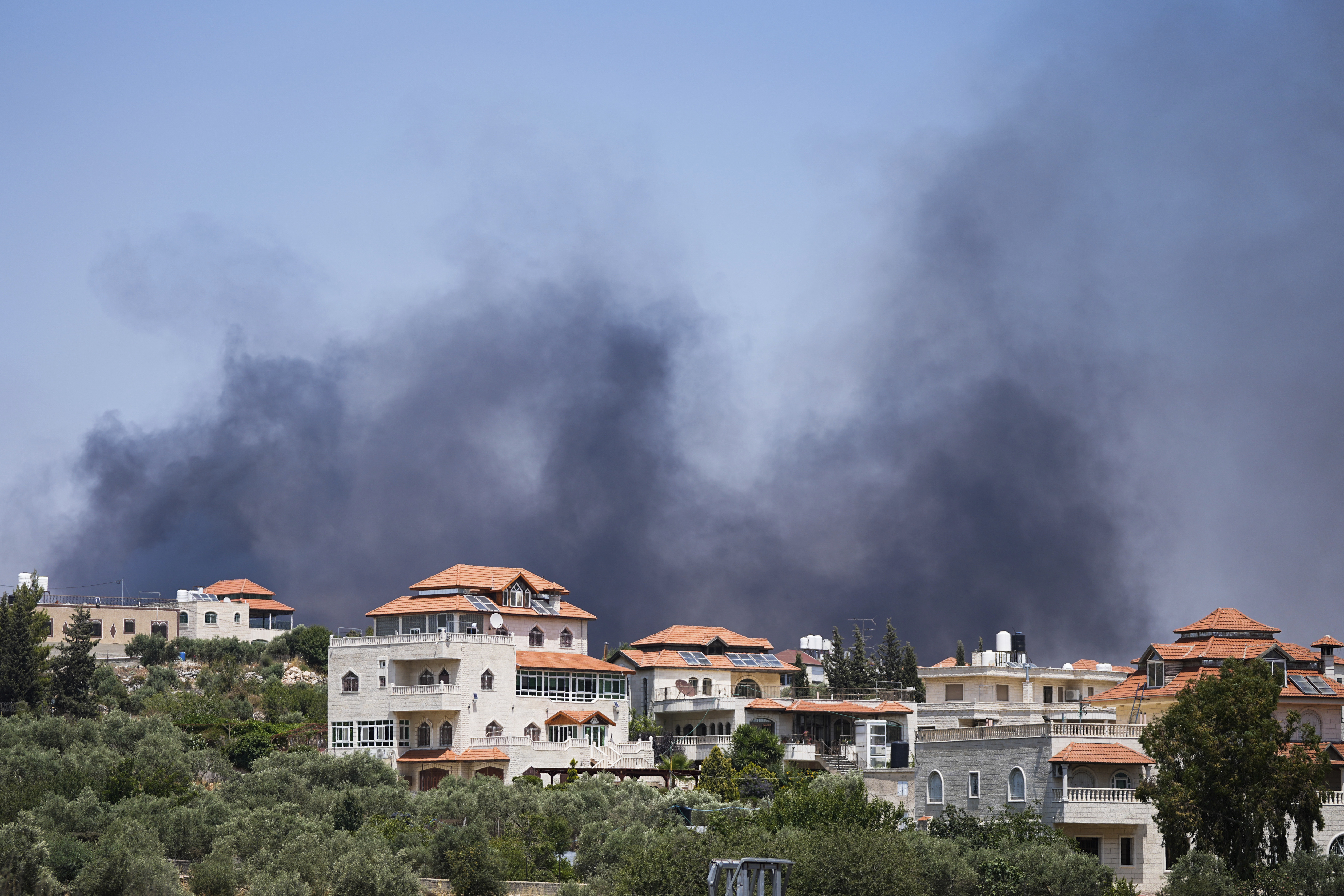 Smoke rises from the West Bank town of Turmus Ayya