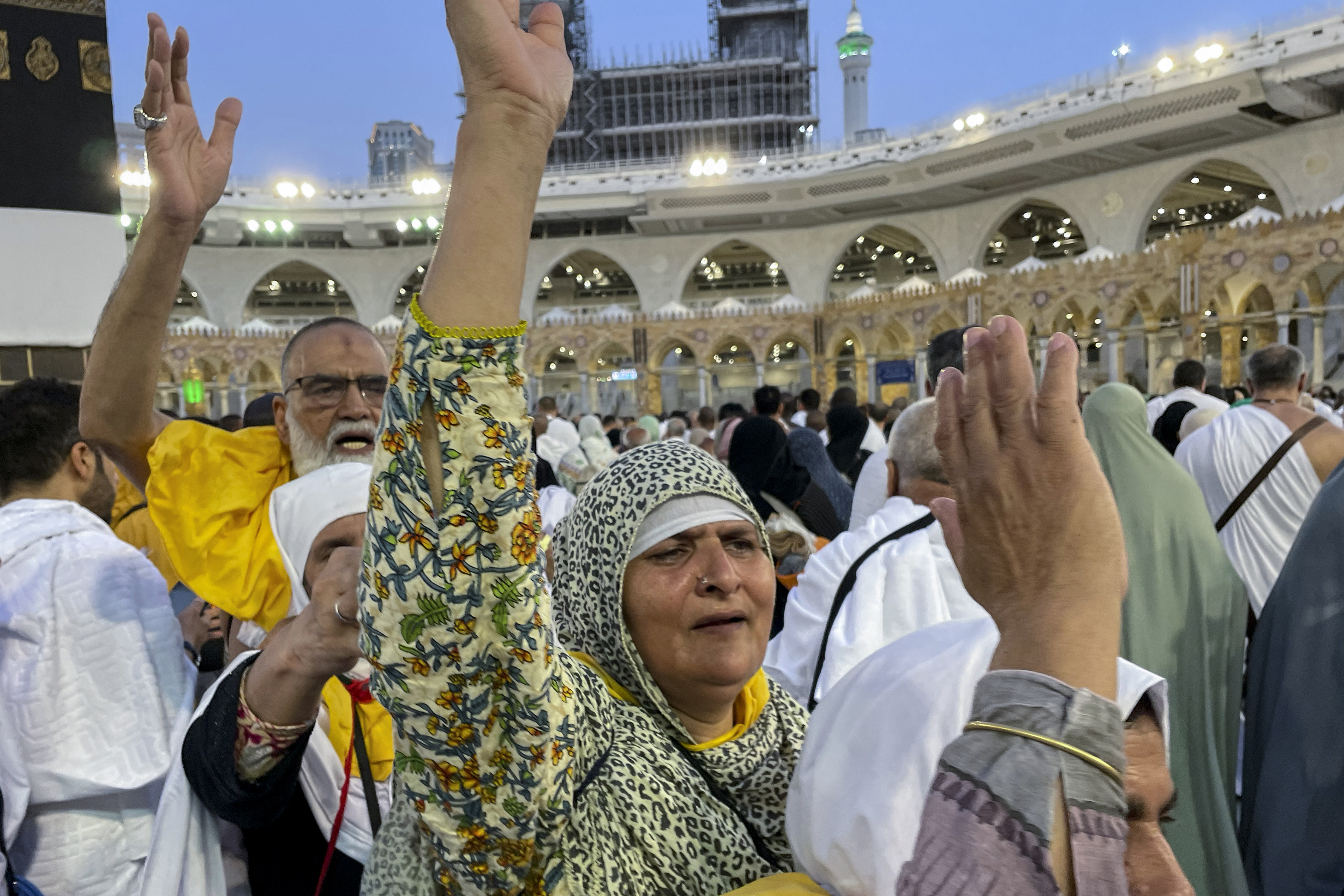 Iranian pilgrims circumambulate around the Kaaba