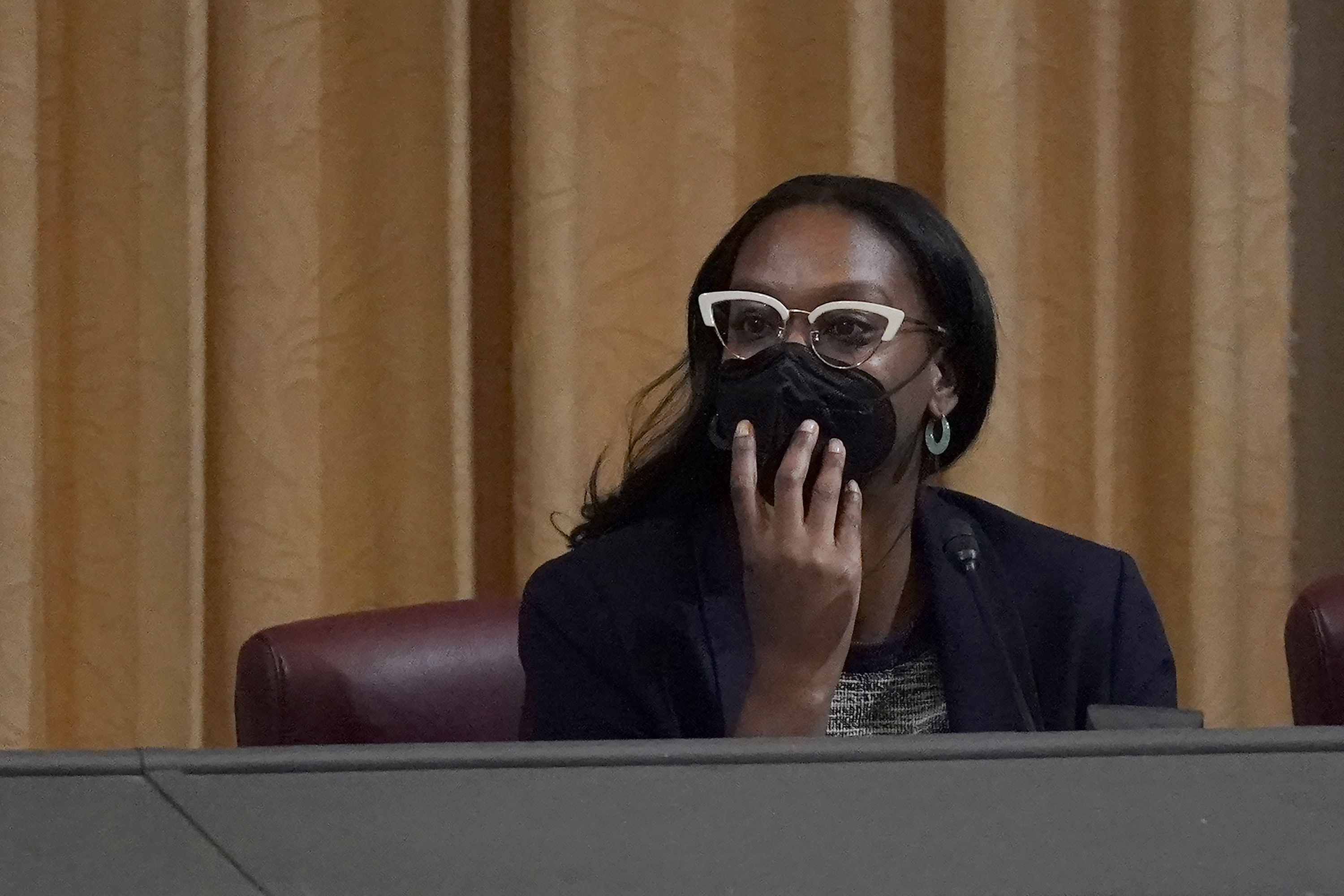 Task Force Chair Kamilah Moore listens to public comment during a meeting on December 14, 2022