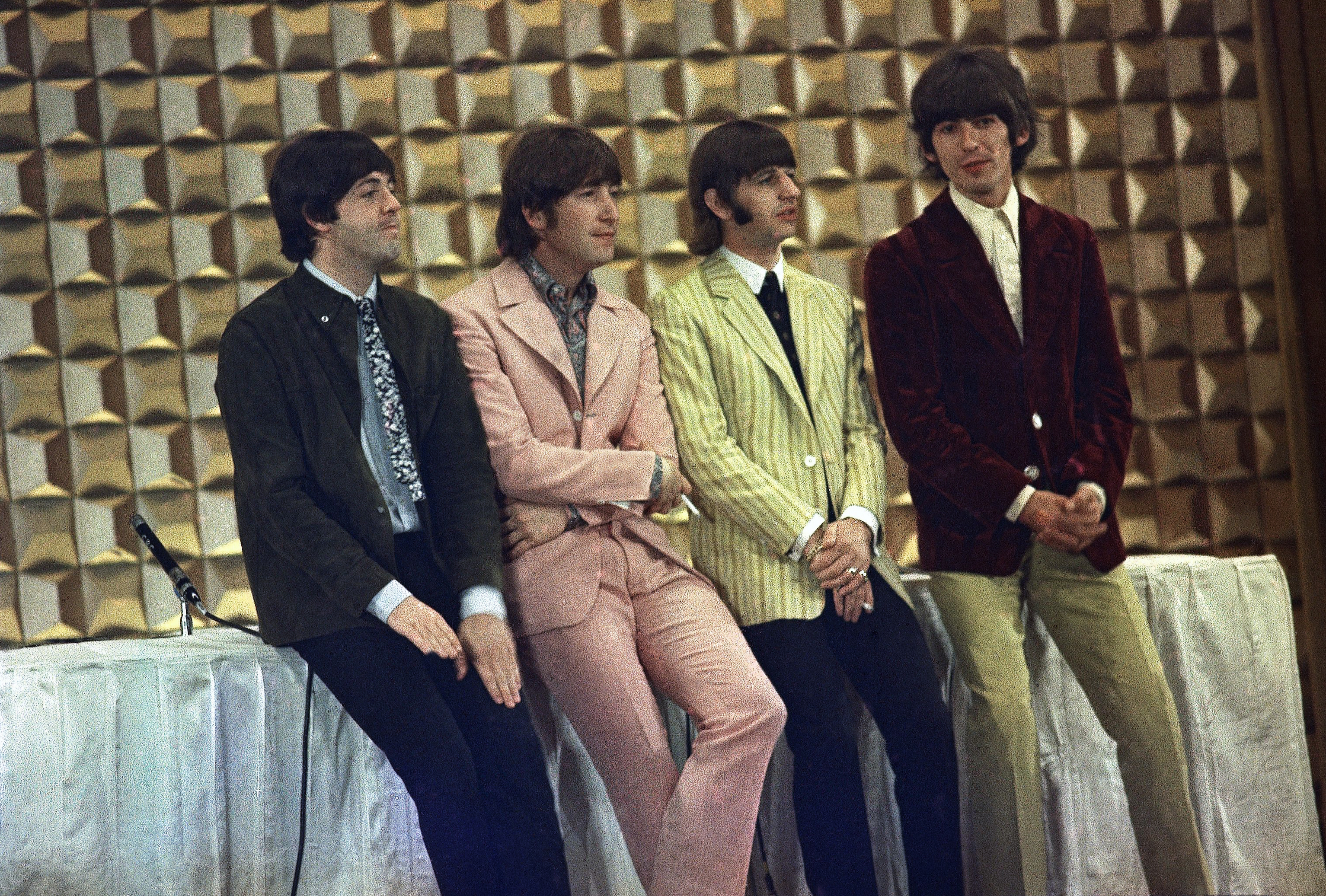 The Beatles speak at a Tokyo news conference, June 1966. 
