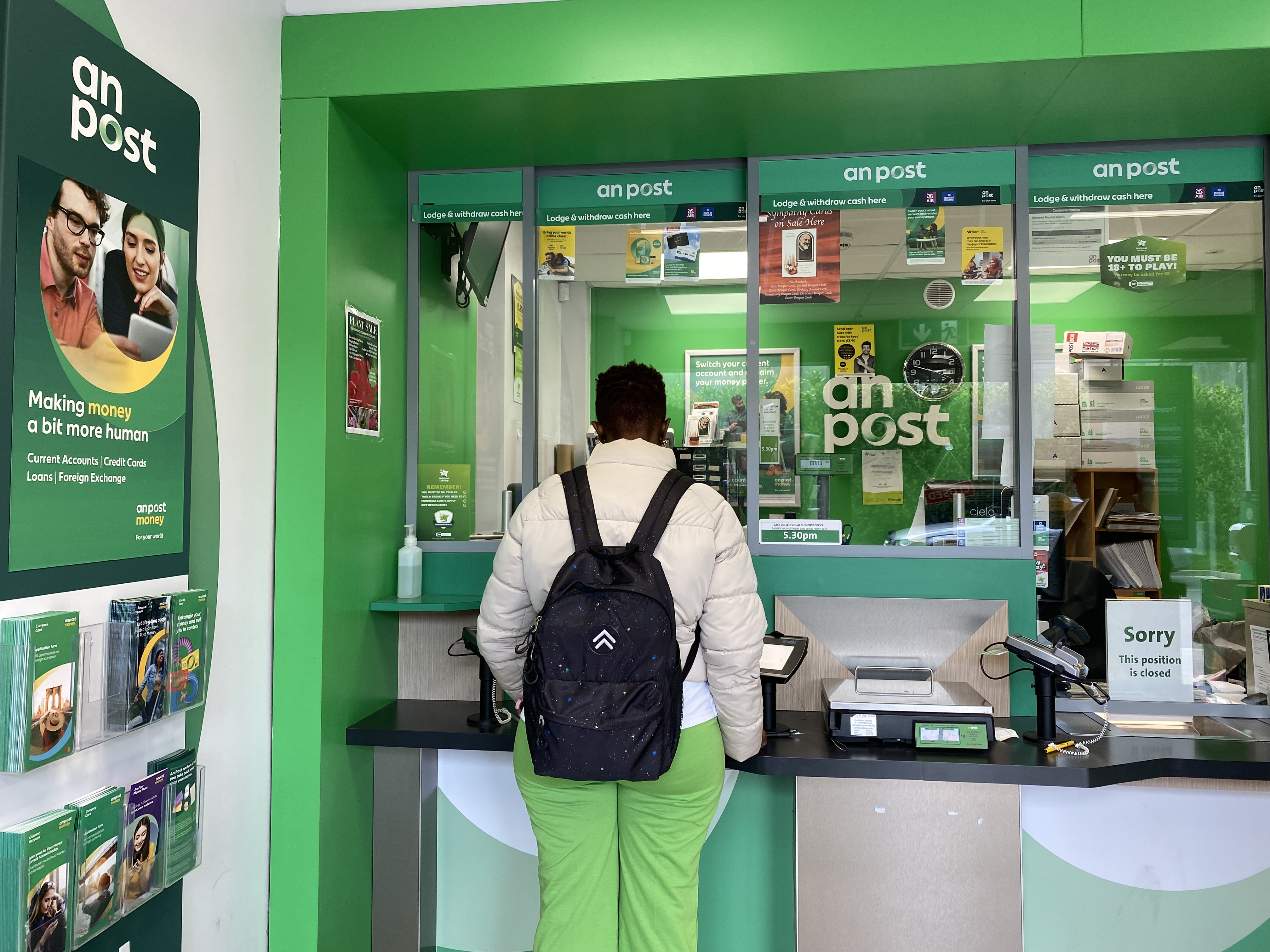 A woman at a post office in Dublin