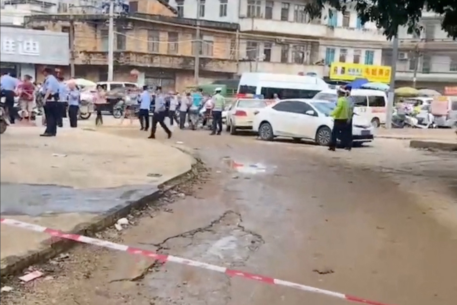 A police cordon is placed in the aftermath of a stabbing attack at a kindergarten in Lianjiang county, Guangdong province, China in this still image obtained from social media video released July 10, 2023. Video obtained by Reuters/via REUTERS THIS IMAGE HAS BEEN SUPPLIED BY A THIRD PARTY. MANDATORY CREDIT. NO RESALES. NO ARCHIVES.