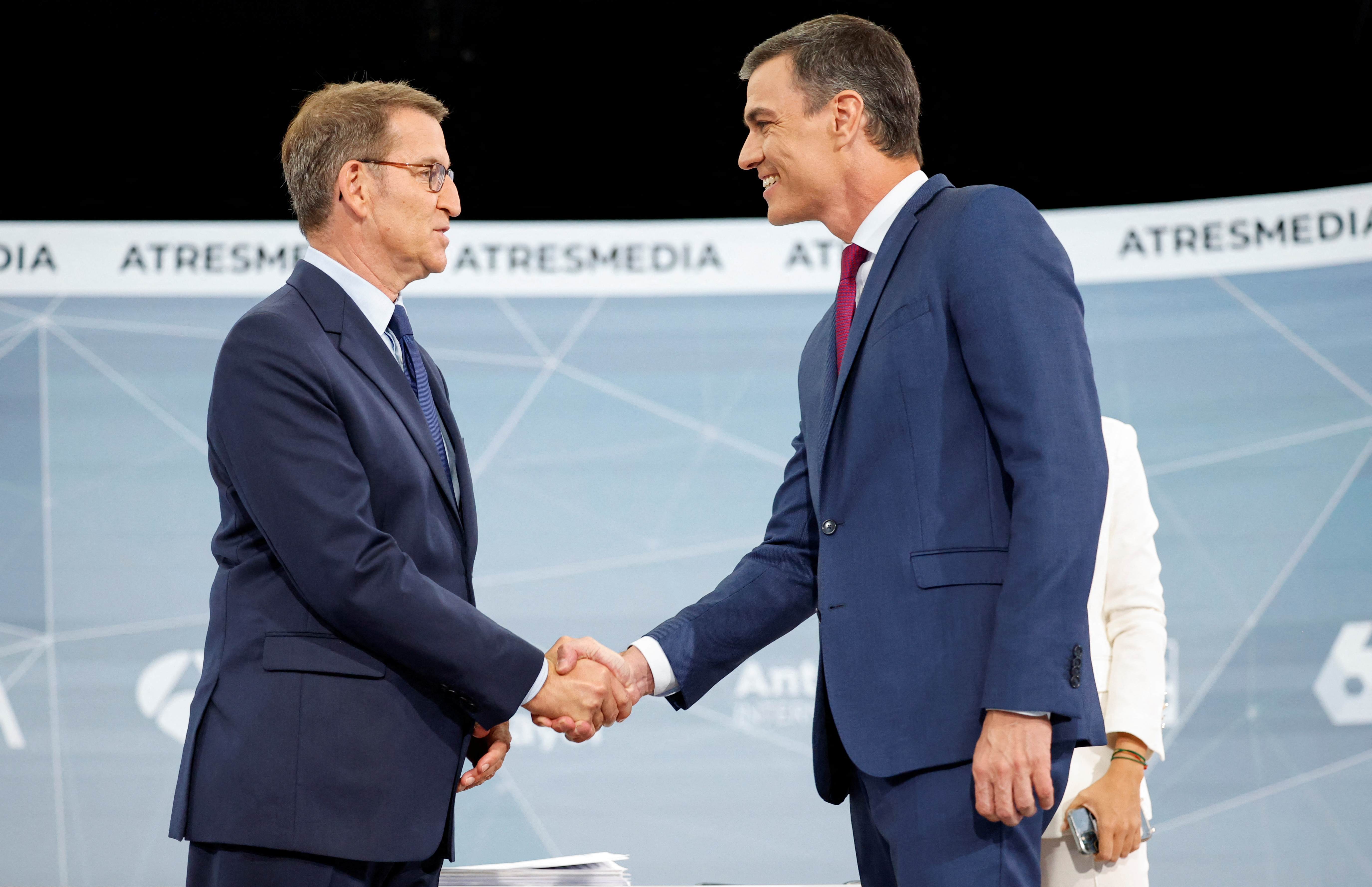Spanish People's Party candidate Alberto Nunez Feijoo and Spain's Prime Minister and Socialist candidate Pedro Sanchez shake hands before a televised debate ahead of snap election in Madrid, Spain.