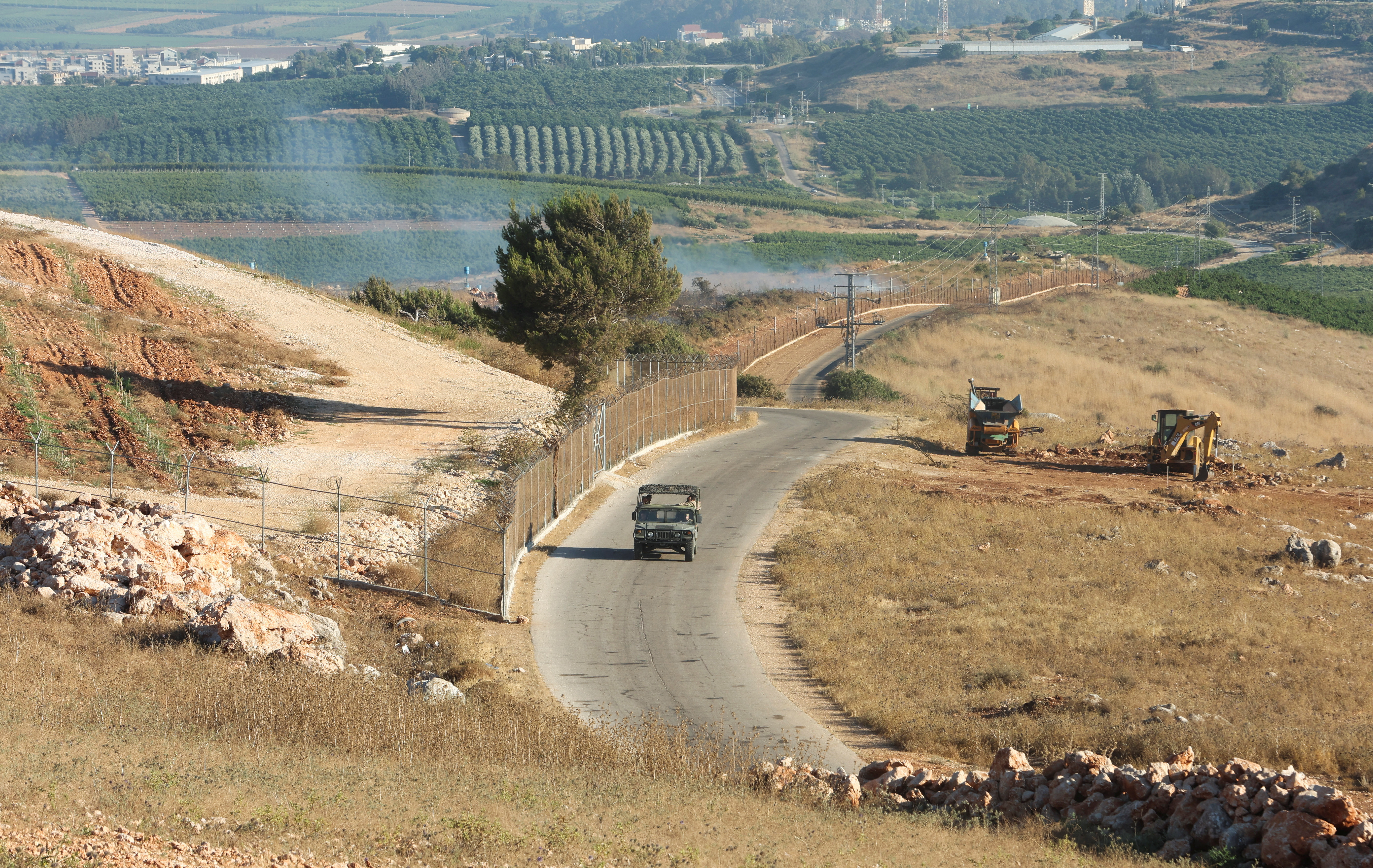 A Lebanese army vehicle drives in Khiam