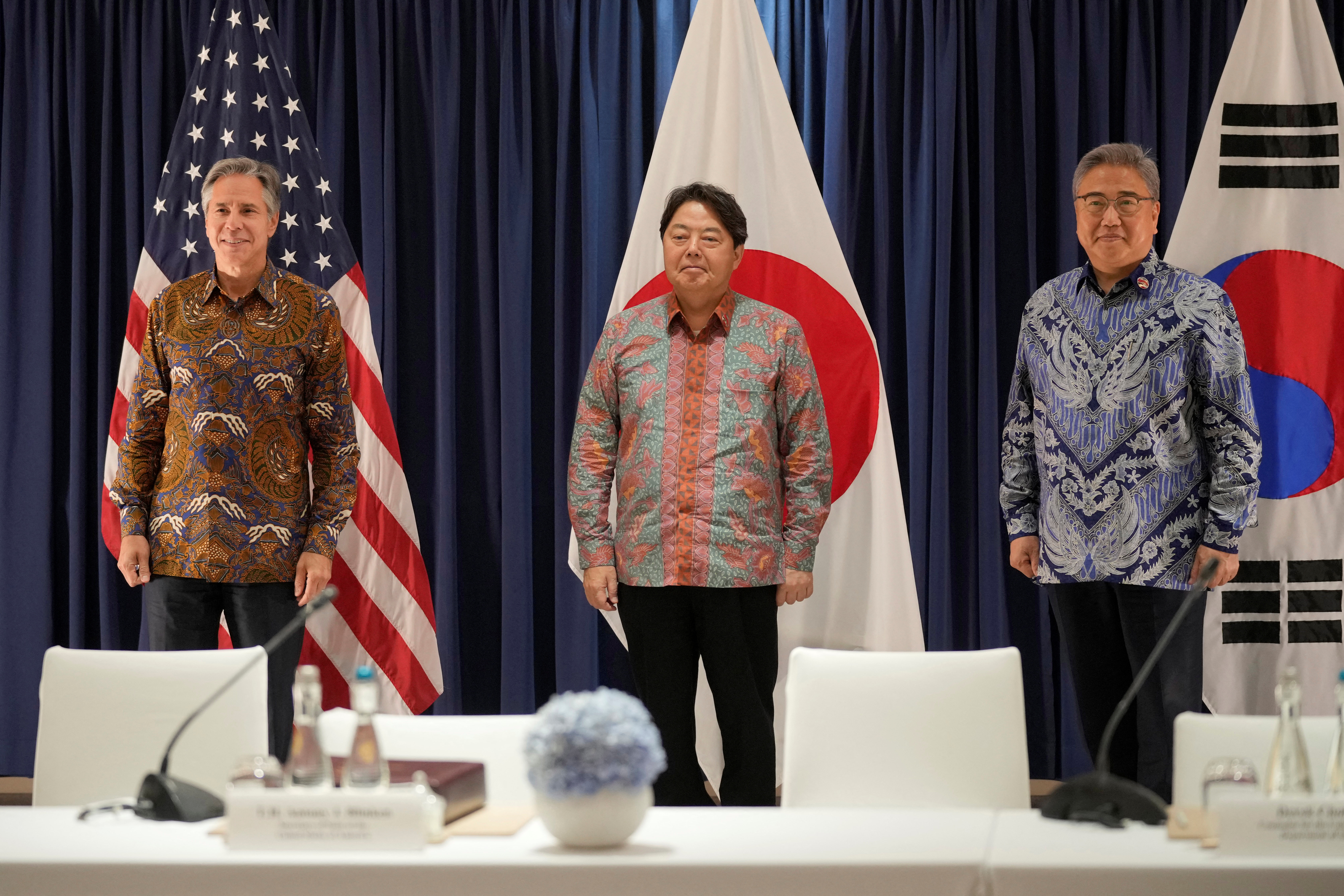 U.S. Secretary of State Antony Blinken, South Korean Foreign Minister Park Jin and Japan's Foreign Minister Yoshimasa Hayashi pose for the media during their meeting in Jakarta, Indonesia, Friday, July 14, 2023. Dita Alangkara/Pool via REUTERS