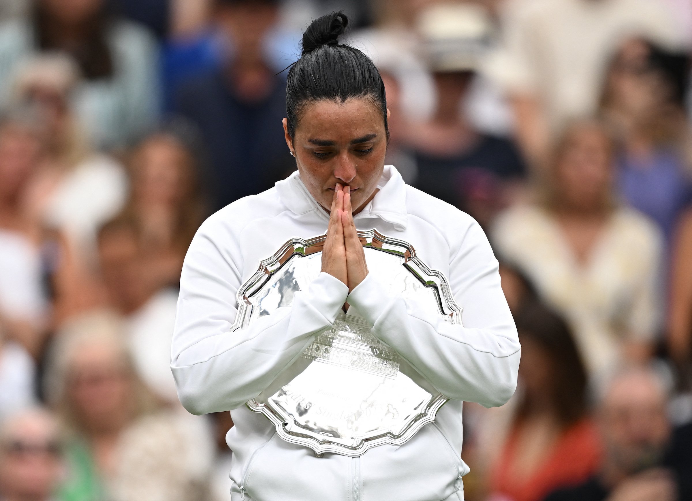 Tunisia’s Ons Jabeur with the runners up trophy after losing her final match against Czech Republic's Marketa Vondrousova.
