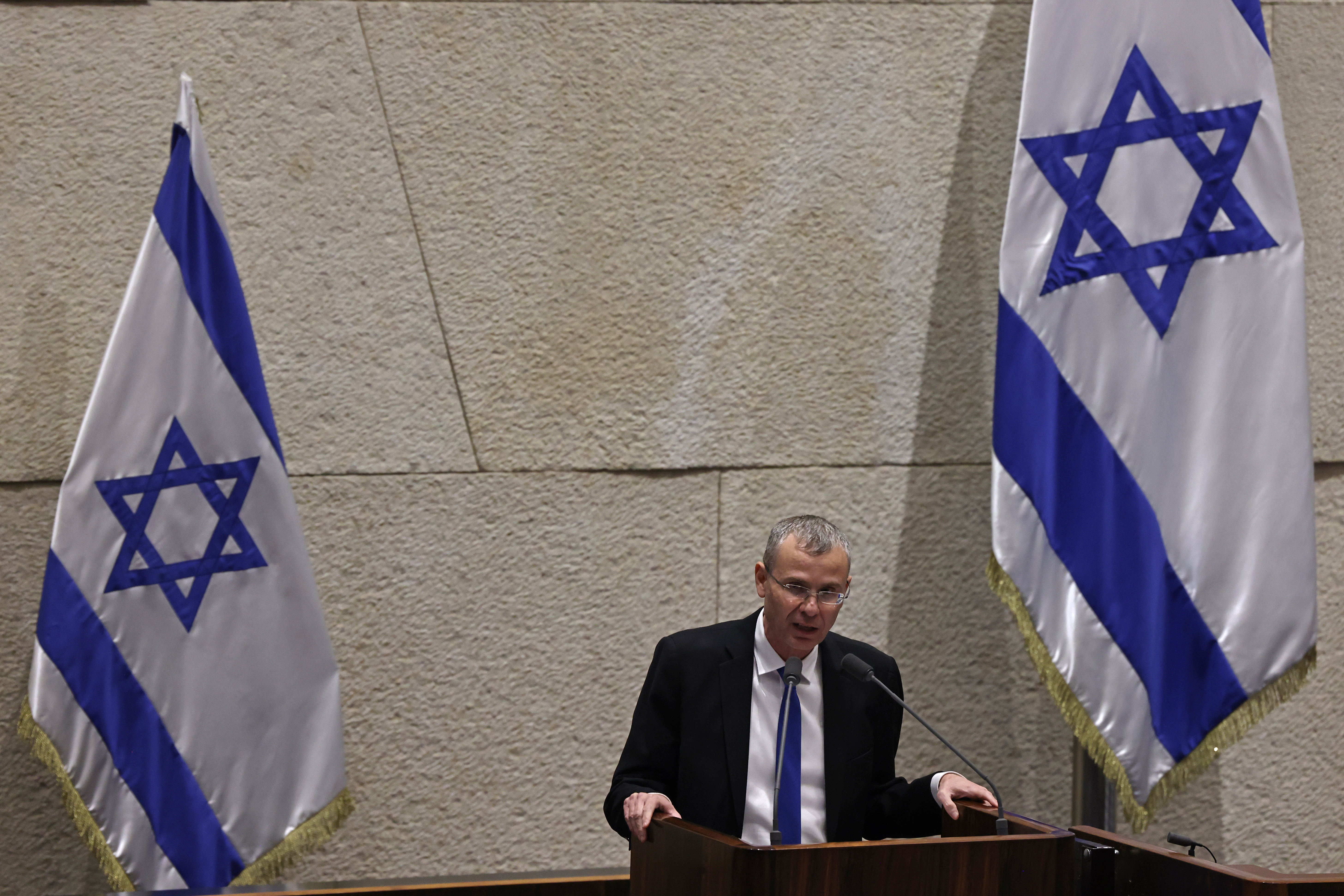 Israel's Minister of Justice Yariv Levin speaks during a parliament session