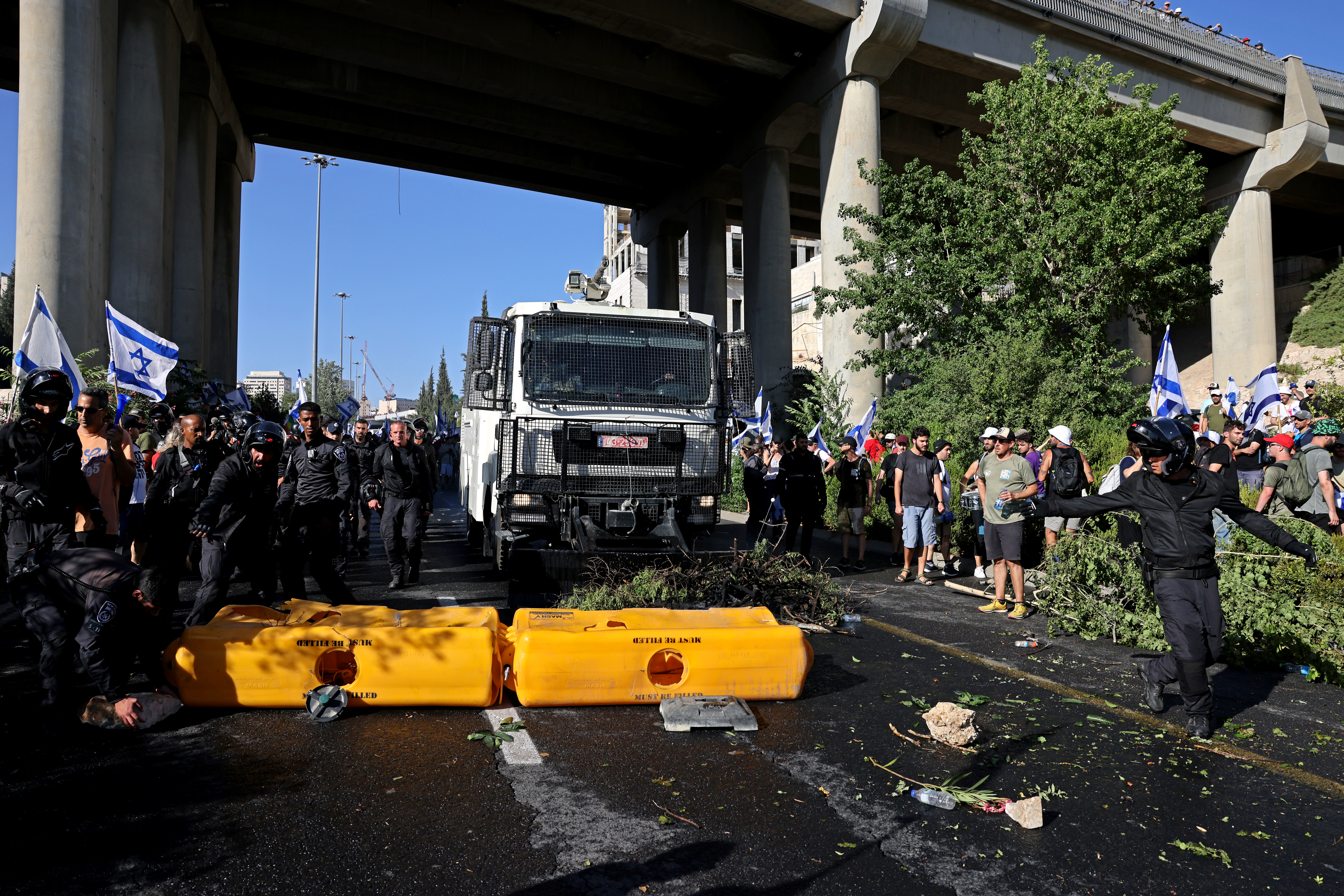 Israeli security forces remove protesters