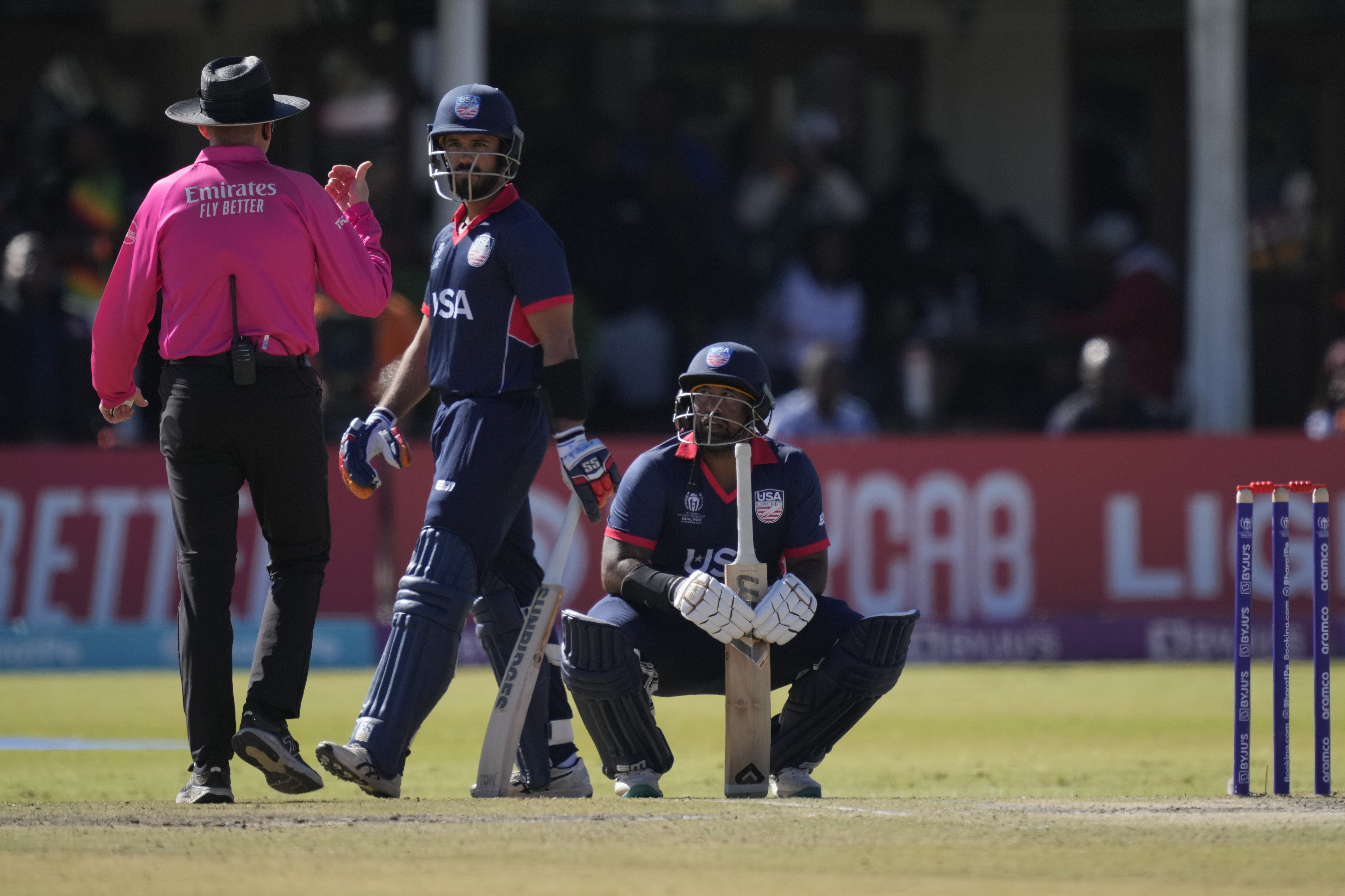 US batsman Gajanand Singh, right, and Shayan Jahangir on the pitch during their ICC Men's Cricket World Cup Qualifier match against the Zimbabwe at Harare Sports Club in Harare, Zimbabwe,Monday June, 26, 2023