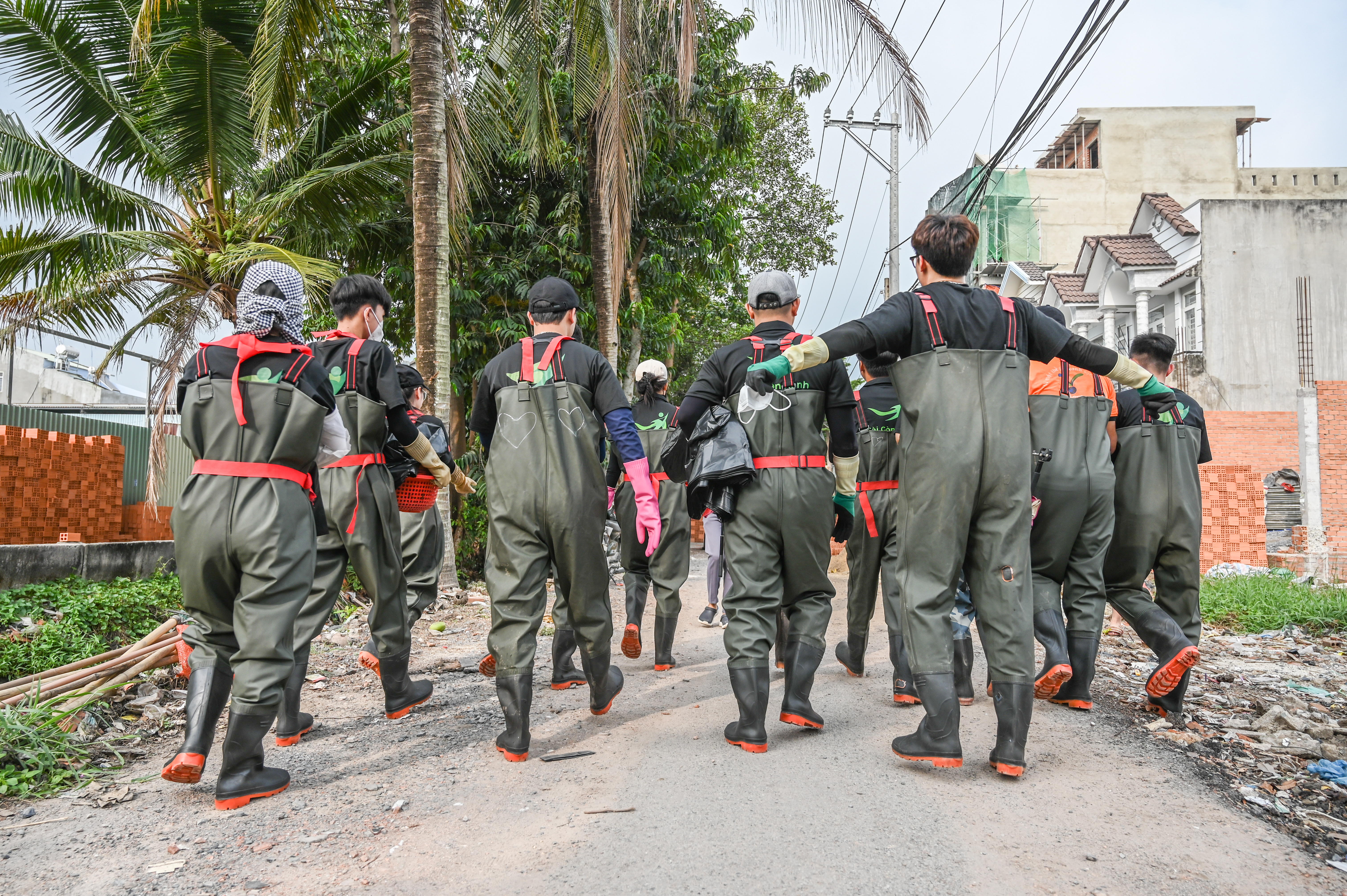 Volunteers off to work in their rubber waders