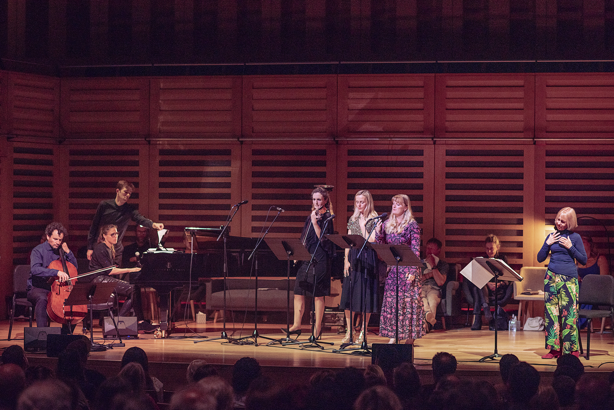 A picture of a choir and orchestra performing