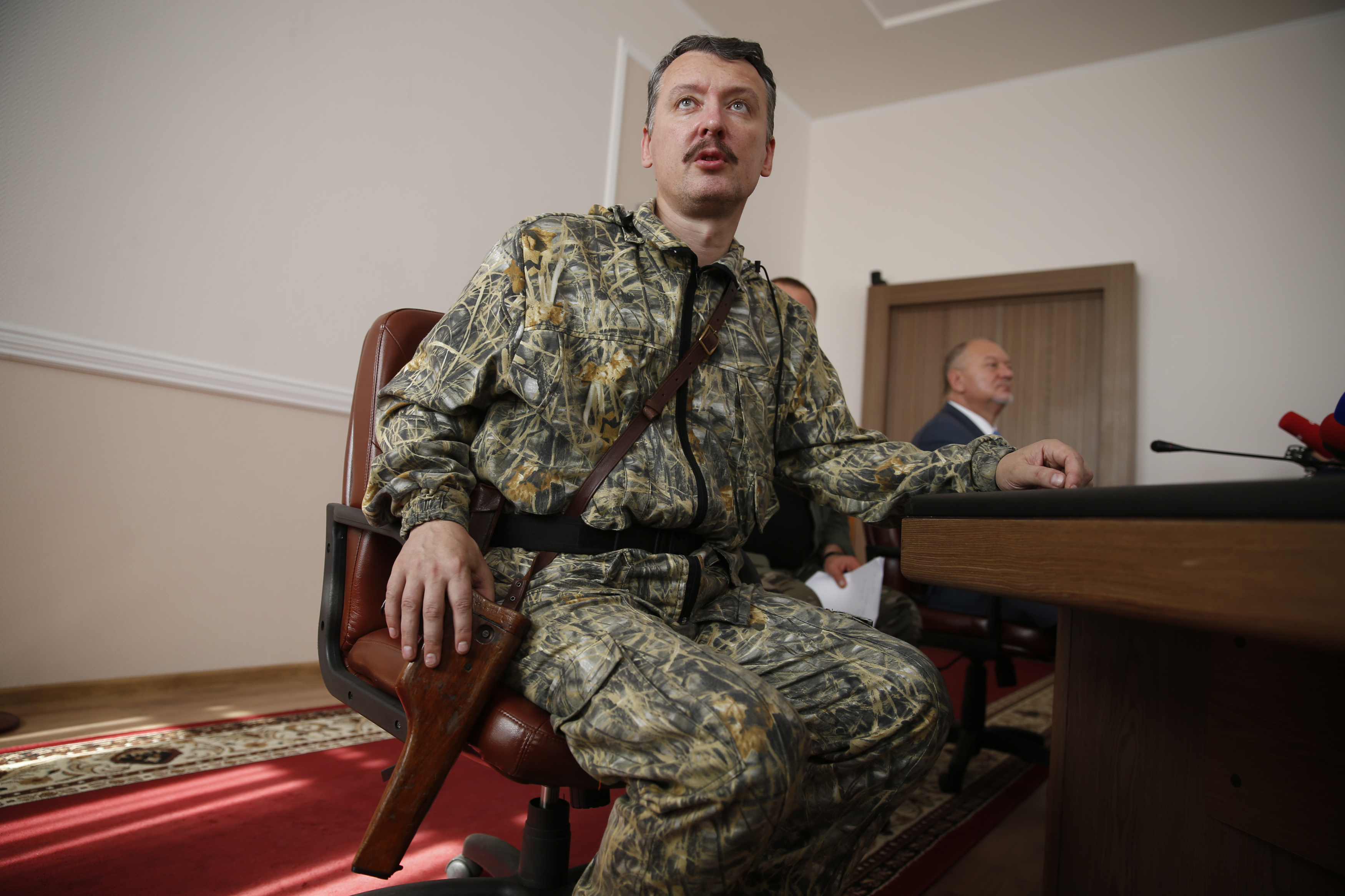 Pro-Russian separatist commander Igor Strelkov takes part in a news conference in the eastern Ukrainian city of Donetsk, July 10, 2014. Ukrainian forces regained more ground but sustained further casualties on Thursday in clashes with separatists, while two Western allies urged Russia's Vladimir Putin to exert more pressure on the rebels to find a negotiated end to the conflict. REUTERS/Maxim Zmeyev (UKRAINE - Tags: POLITICS CIVIL UNREST MILITARY CONFLICT)