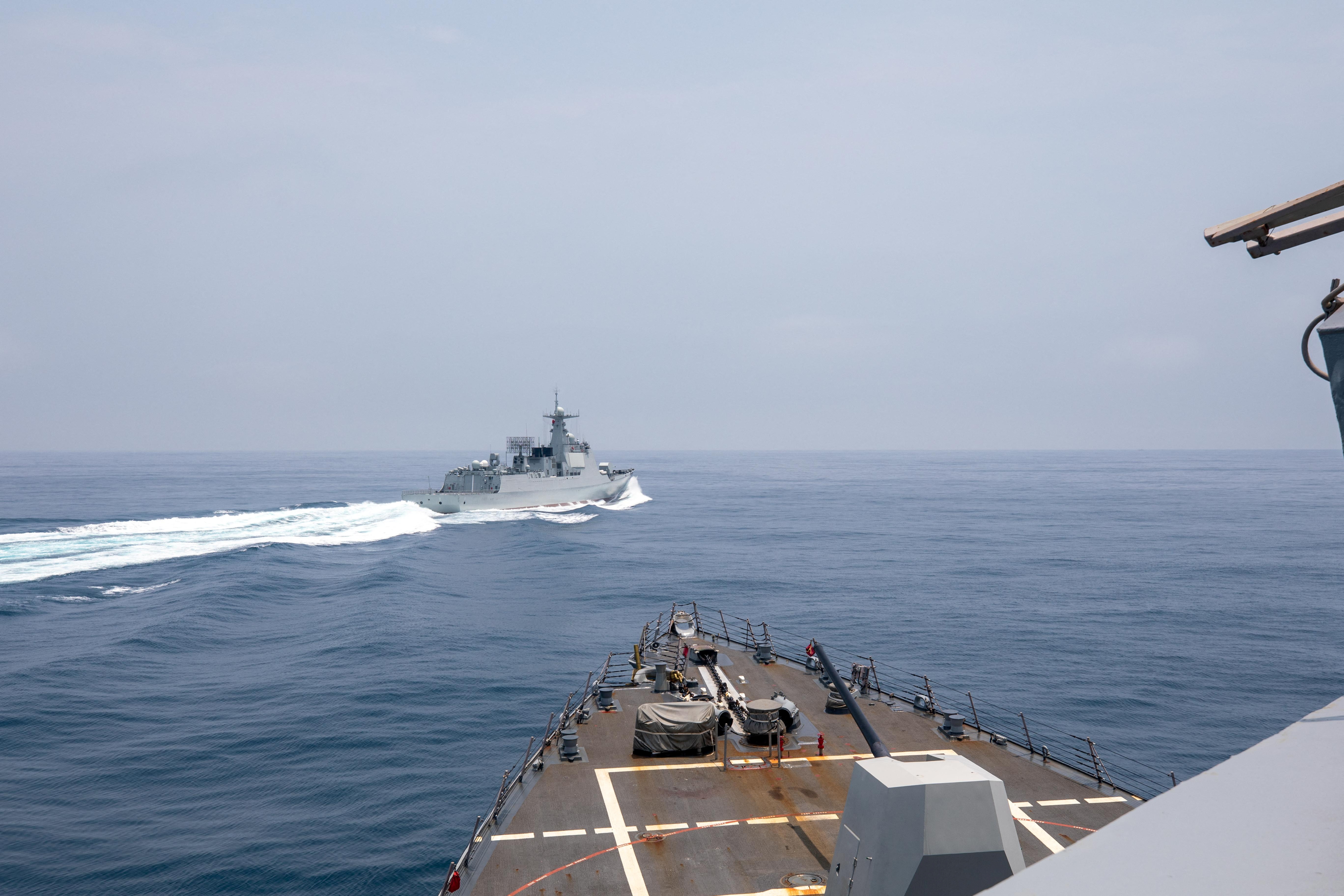 Chinese warship Luyang III sails near the U.S. destroyer USS Chung-Hoon, as seen from the deck of U.S. destroyer, in the Taiwan Strait, June 3, 2023, in this handout picture. U.S. Navy/Mass Communication Specialist 1st Class Andre T. Richard/Handout via REUTERS THIS IMAGE HAS BEEN SUPPLIED BY A THIRD PARTY. MANDATORY CREDIT