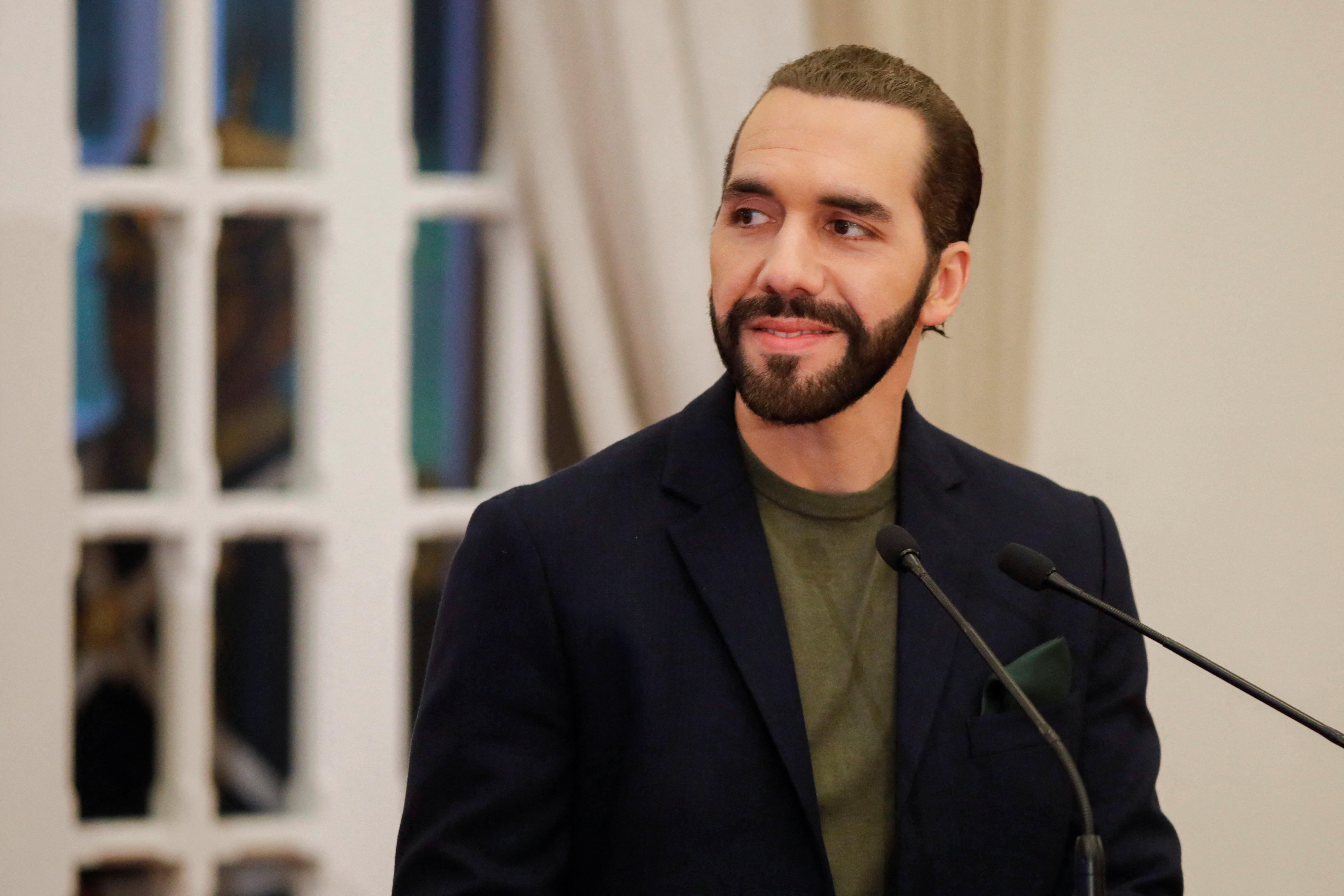 El Salvador's President Nayib Bukele listens to mexican film producer and actor of the movie "Sound of Freedom" Eduardo Verastegui during a press conference after a meeting, in San Salvador, El Salvador July 28, 2023.