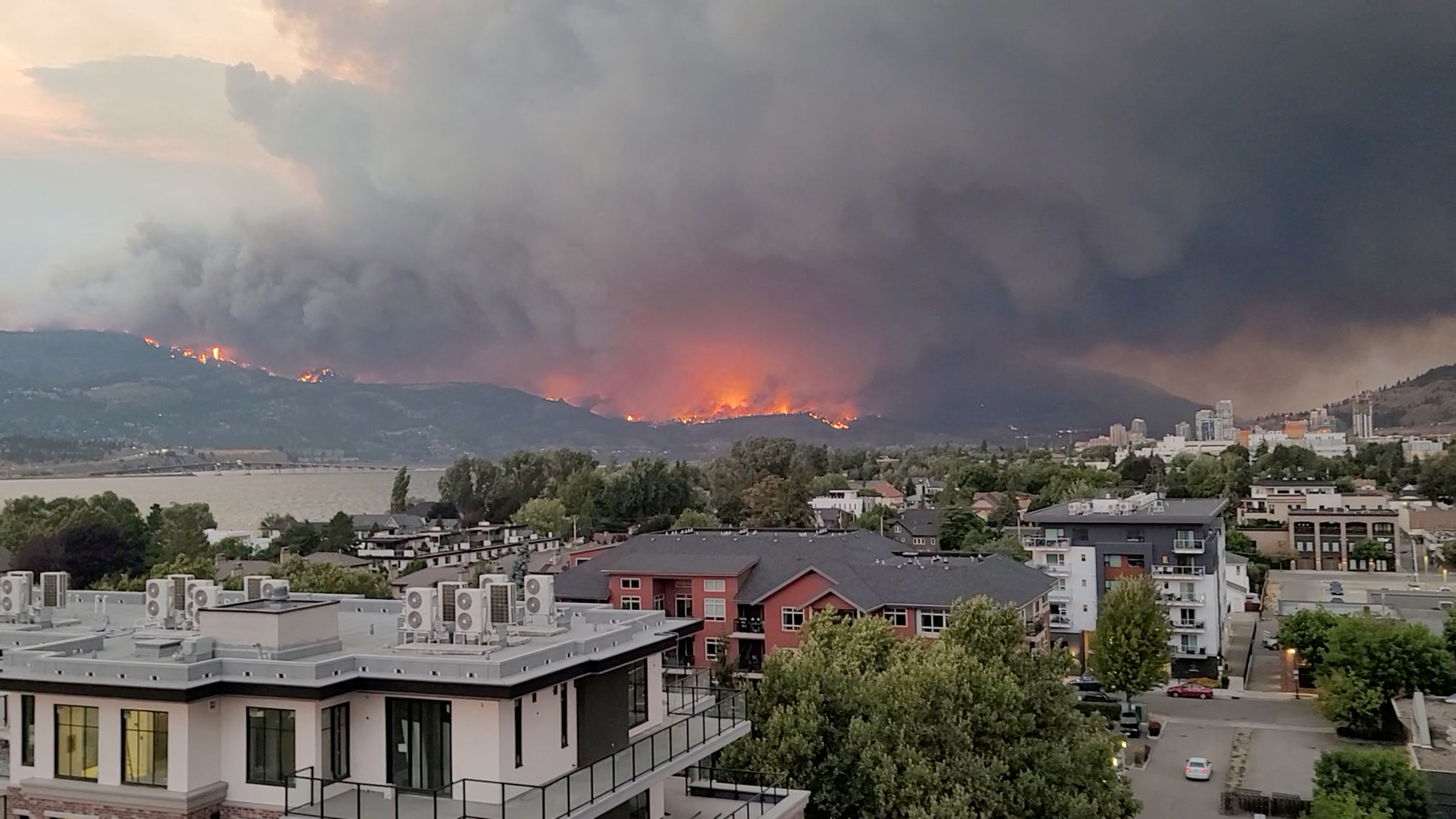Smoke rises from a wildfire in Kelowna, British Columbia