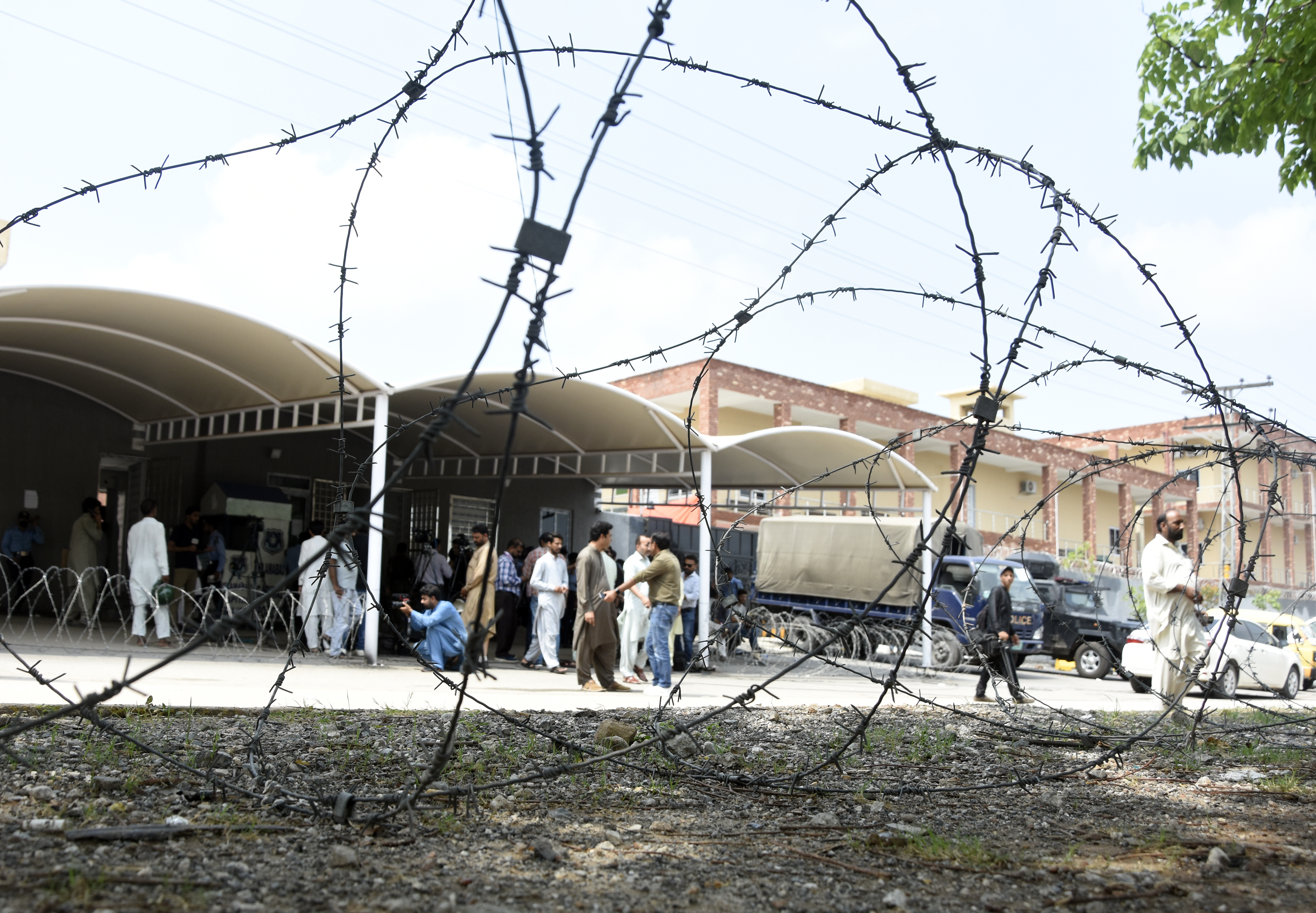 Lawyers, and media gather in front of District Judicial Complex Islamabad