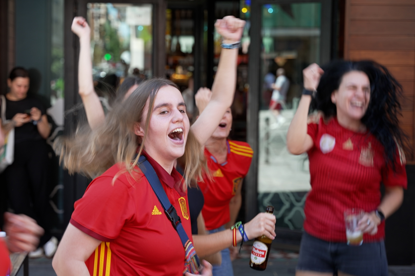 Fans celebrate outside the WiZink Arena 