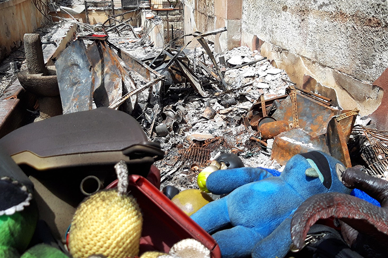 The Melis lost everything except their car in the fires that destroyed their home on July 25 [Photo courtesy of Claudio Meli]